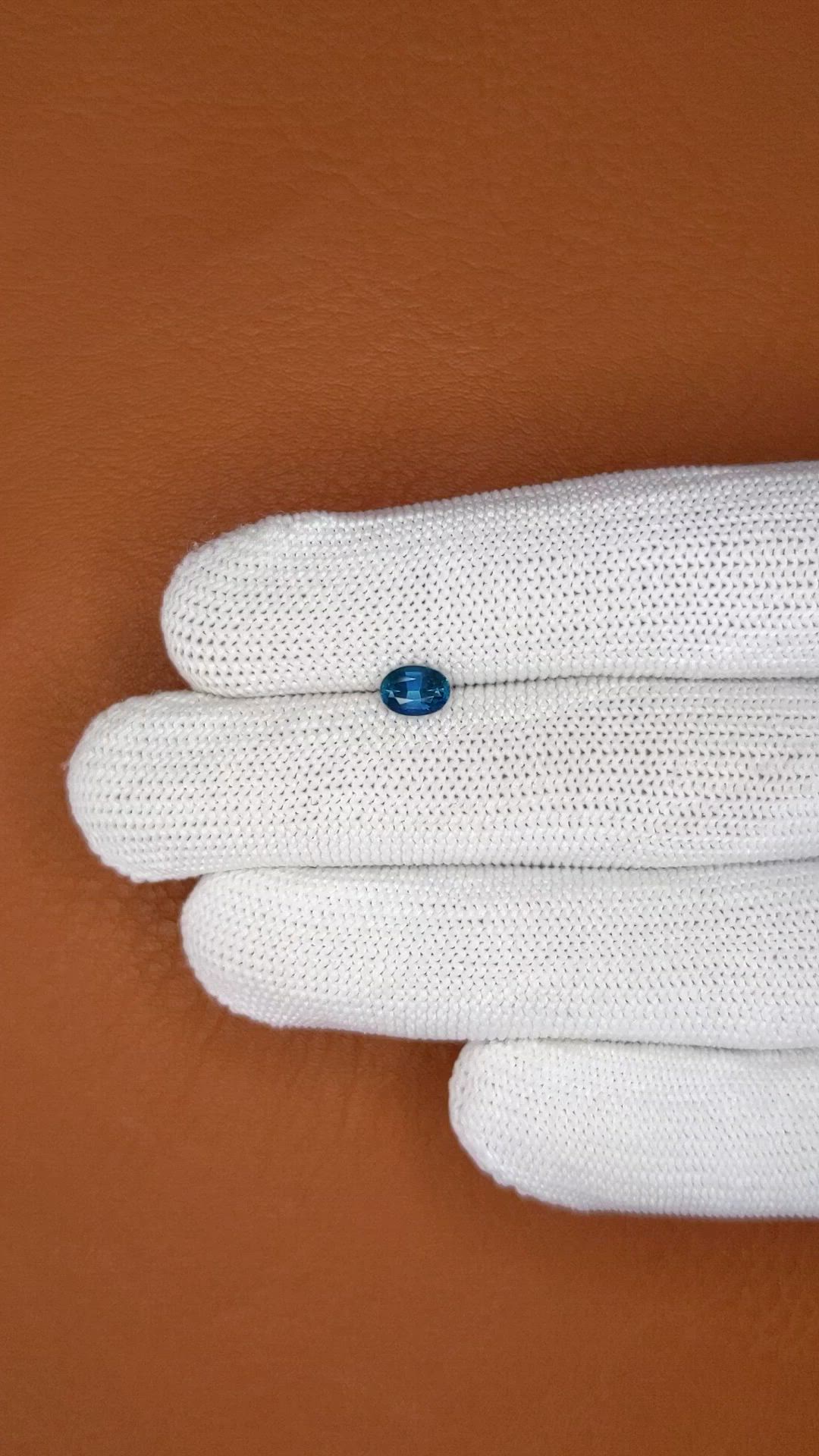 0.81 Ct. Greenish Blue Sapphire from Madagascar Size Video