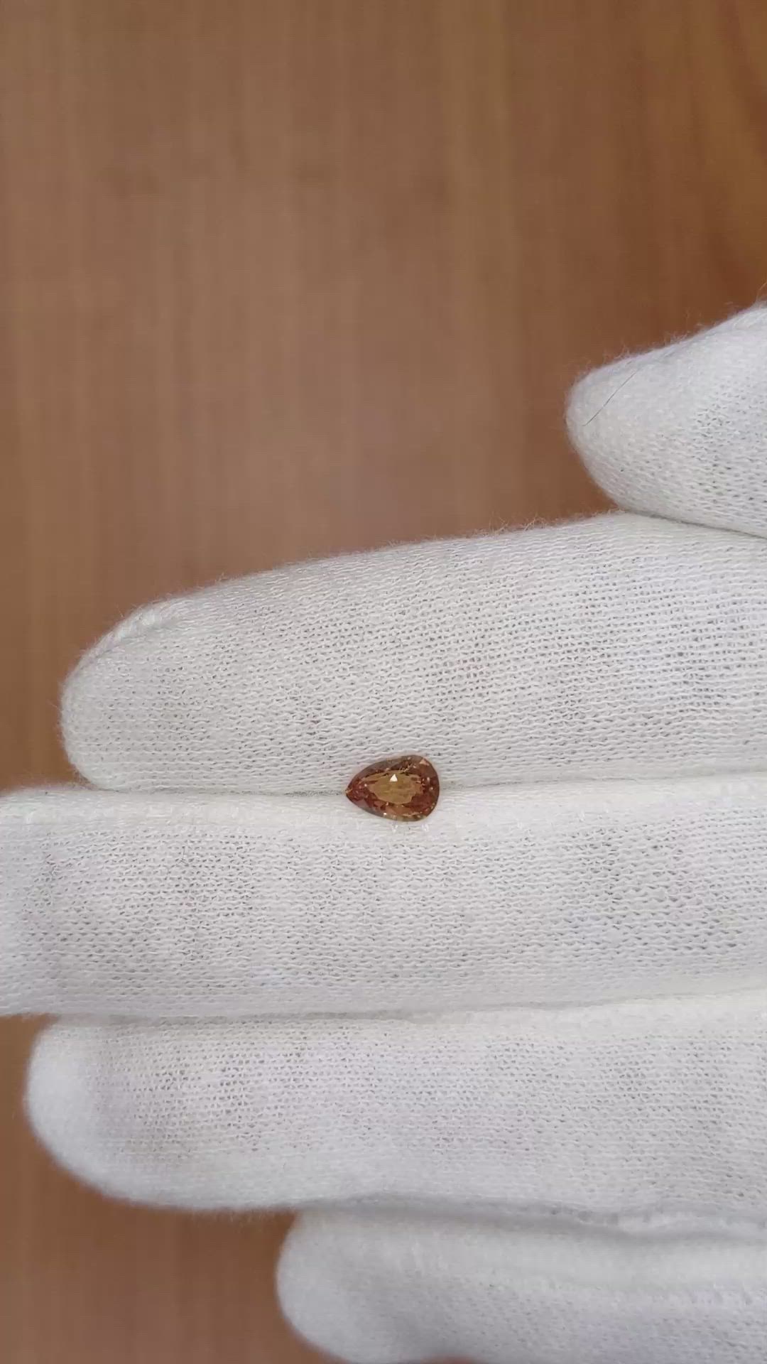 0.72 Ct. Yellowish Orange Sapphire from Ceylon (Sri Lanka) Size Video