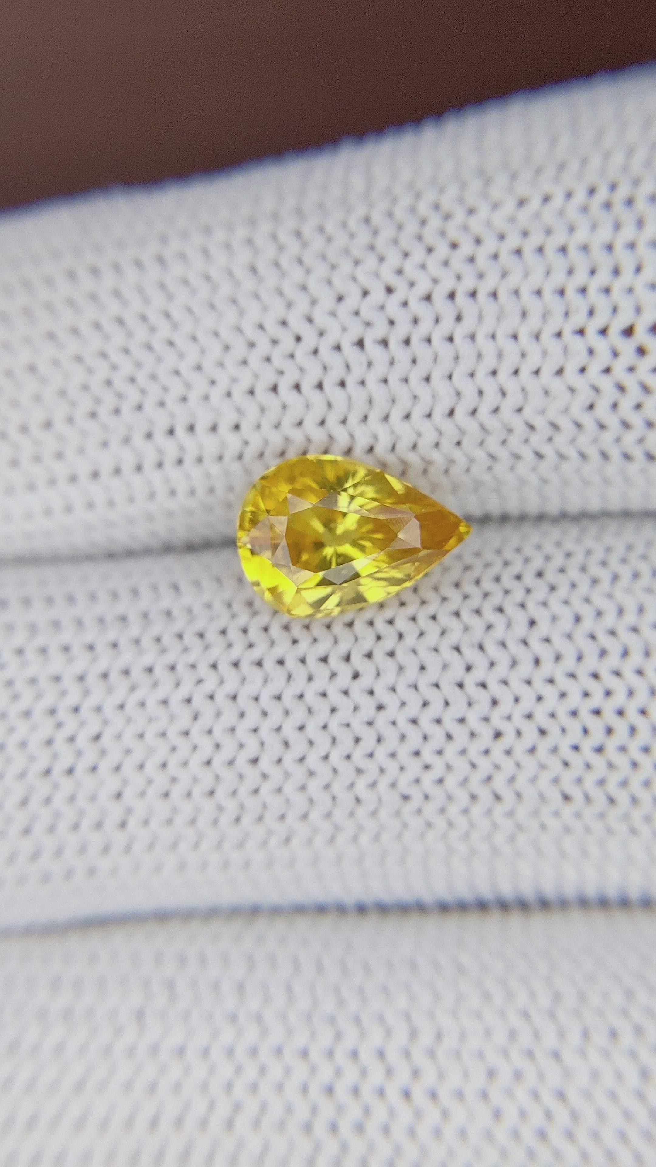 2.57 Ct. Orangish Yellow Sapphire from Ceylon (Sri Lanka) Size Video