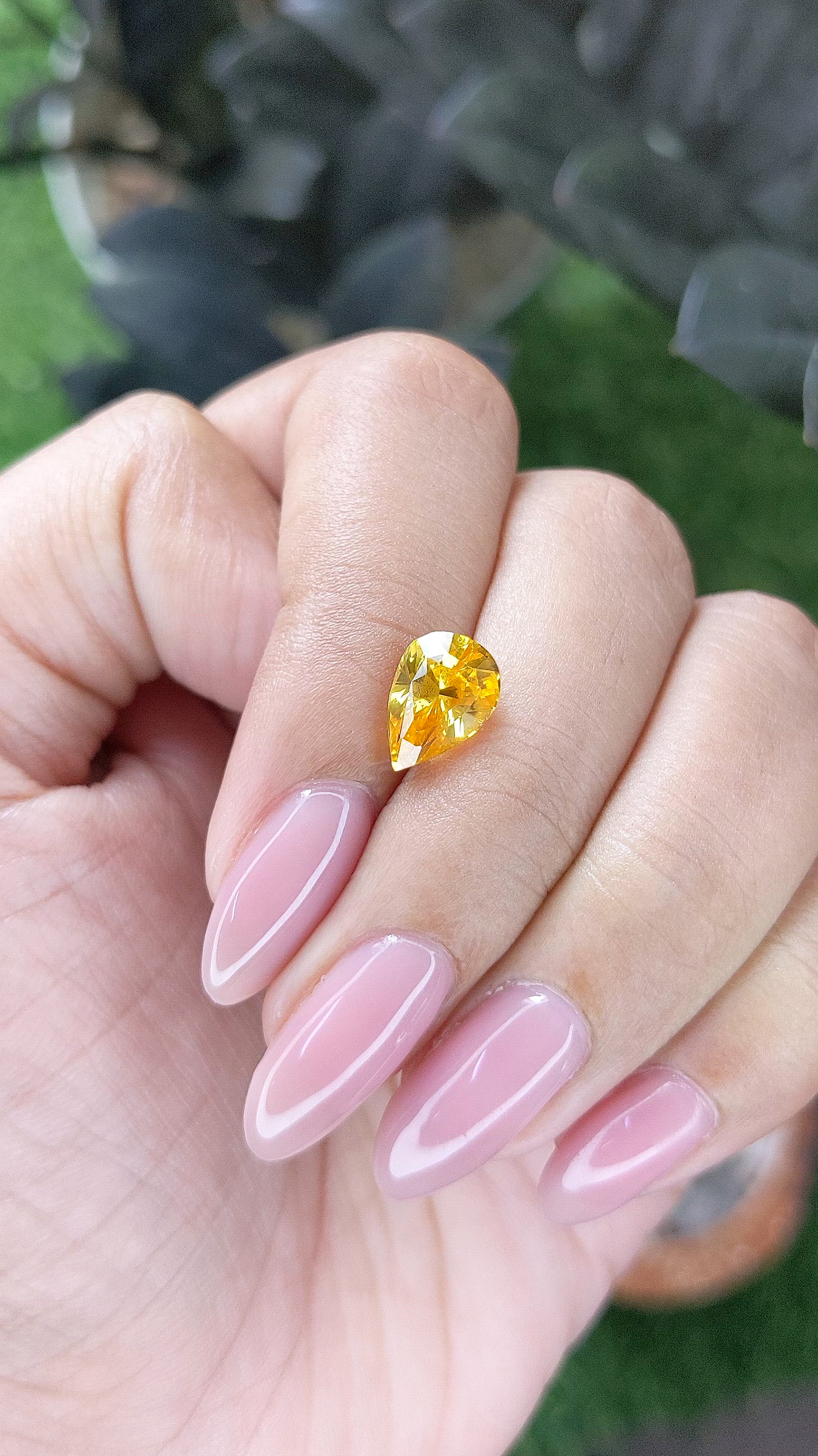 2.57 Ct. Orangish Yellow Sapphire from Ceylon (Sri Lanka) Size Video