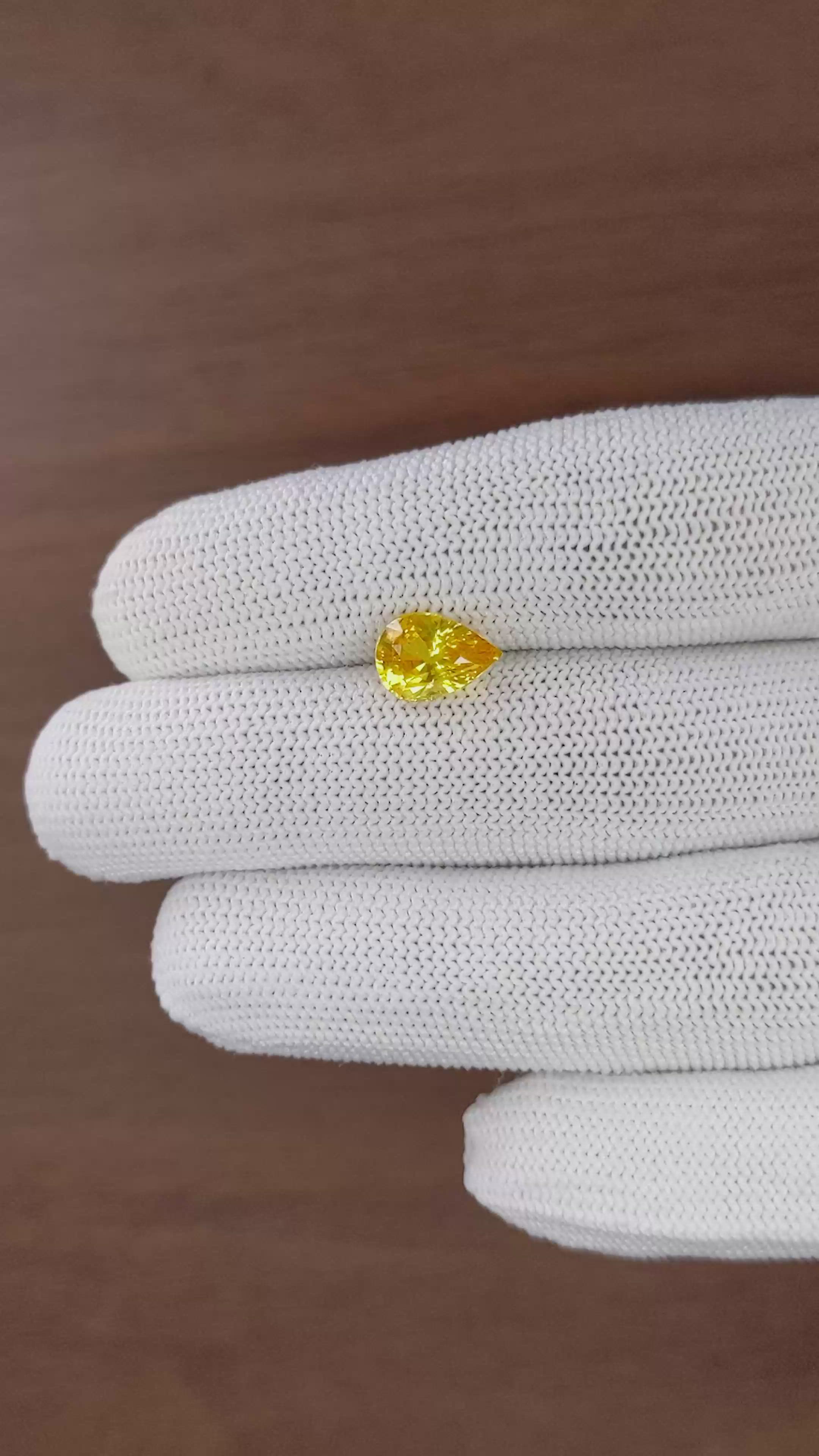 2.57 Ct. Orangish Yellow Sapphire from Ceylon (Sri Lanka) Size Video