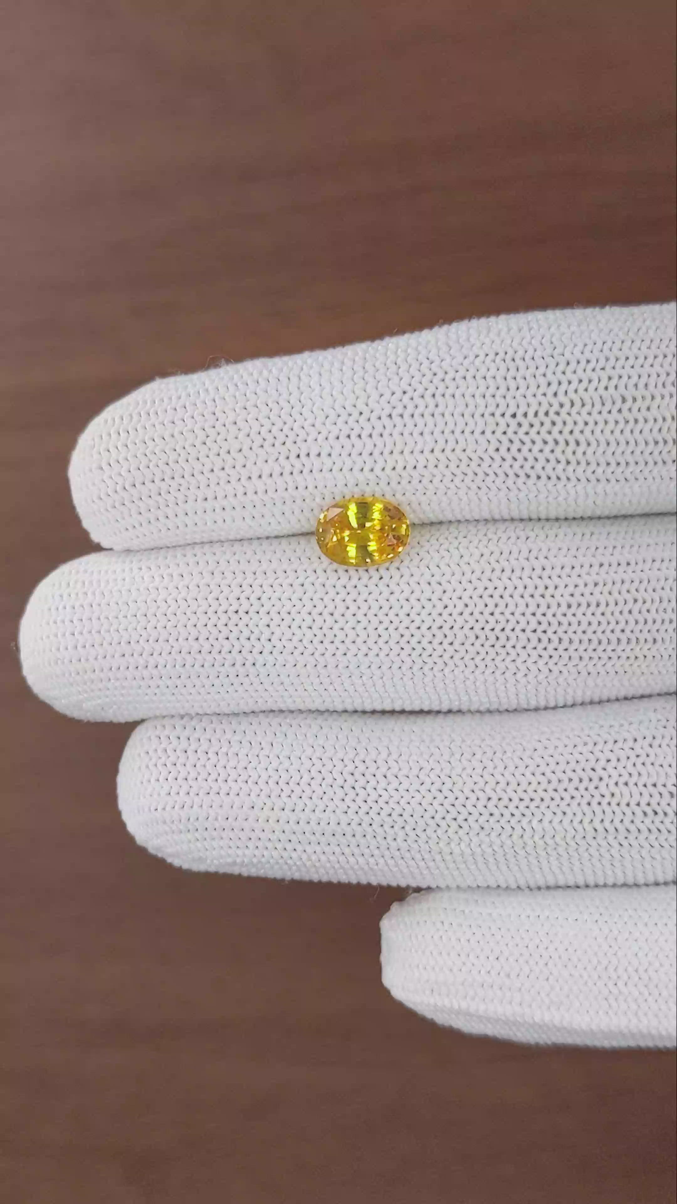 1.83 Ct. Orangish Yellow Sapphire from Ceylon (Sri Lanka) Size Video