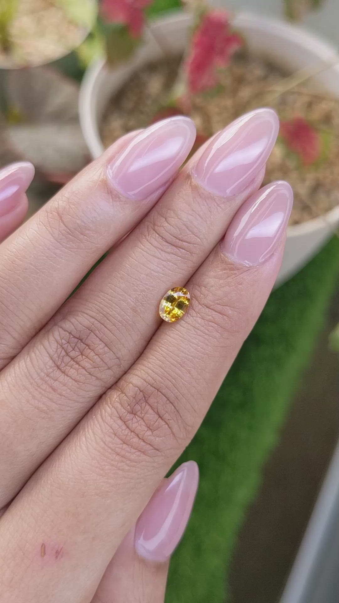 0.73 Ct. Orangish Yellow Sapphire from Ceylon (Sri Lanka) Size Video