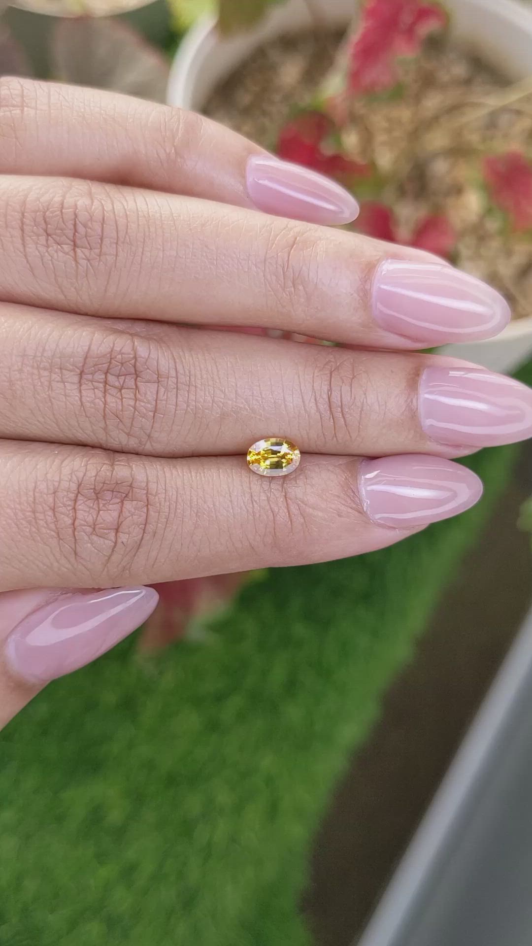 0.73 Ct. Orangish Yellow Sapphire from Ceylon (Sri Lanka) Size Video
