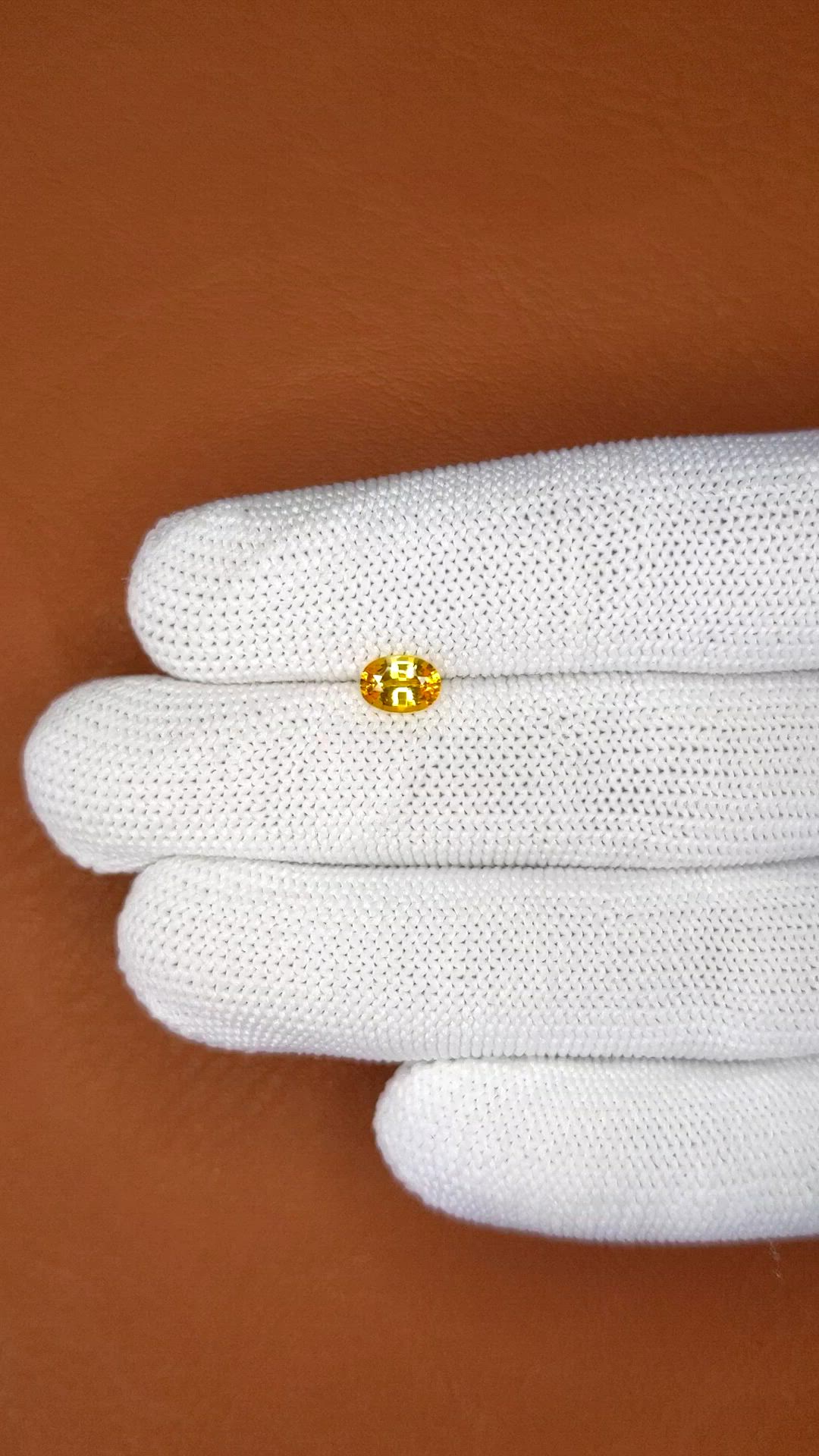 0.73 Ct. Orangish Yellow Sapphire from Ceylon (Sri Lanka) Size Video