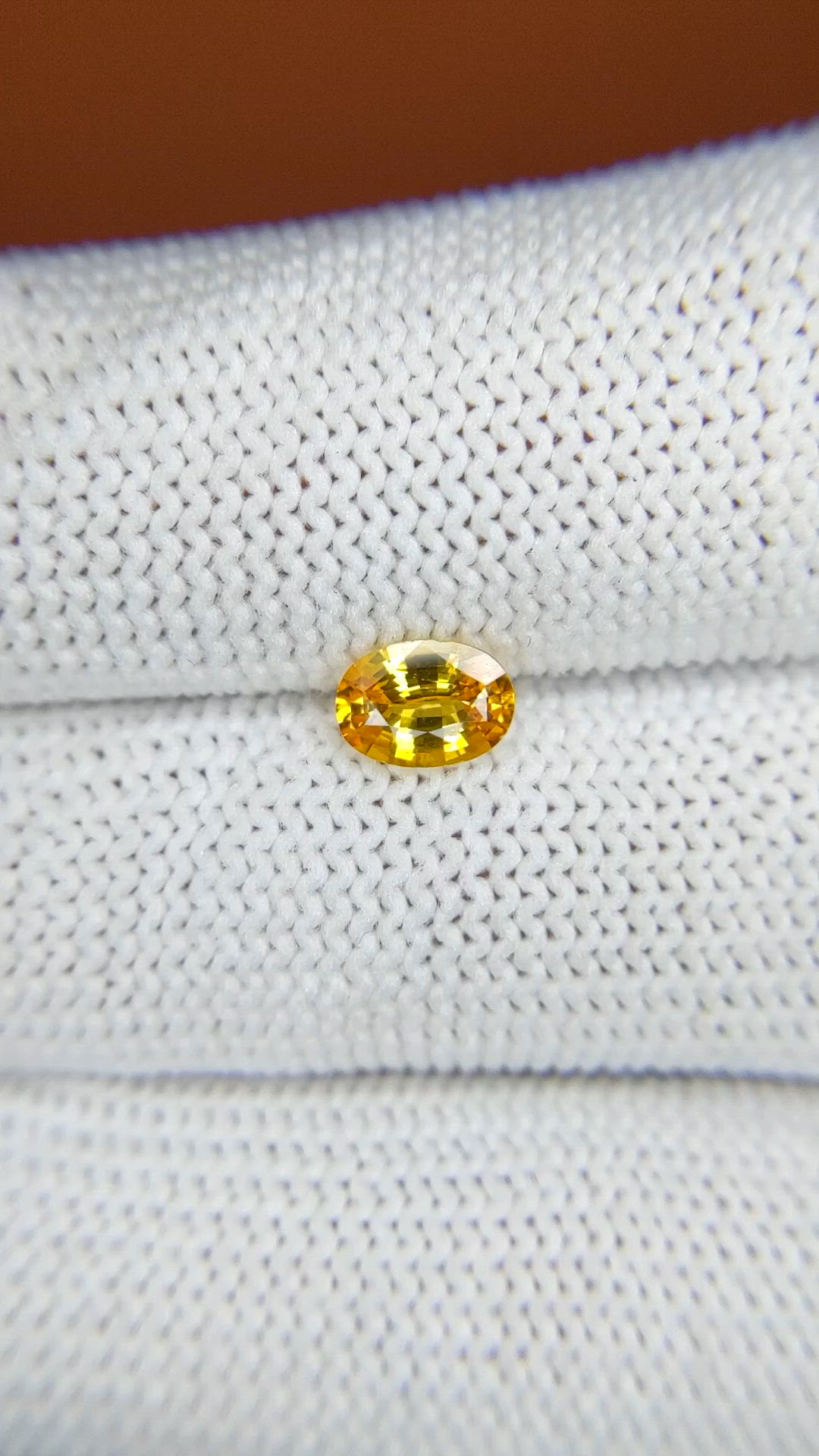 0.73 Ct. Orangish Yellow Sapphire from Ceylon (Sri Lanka) Size Video