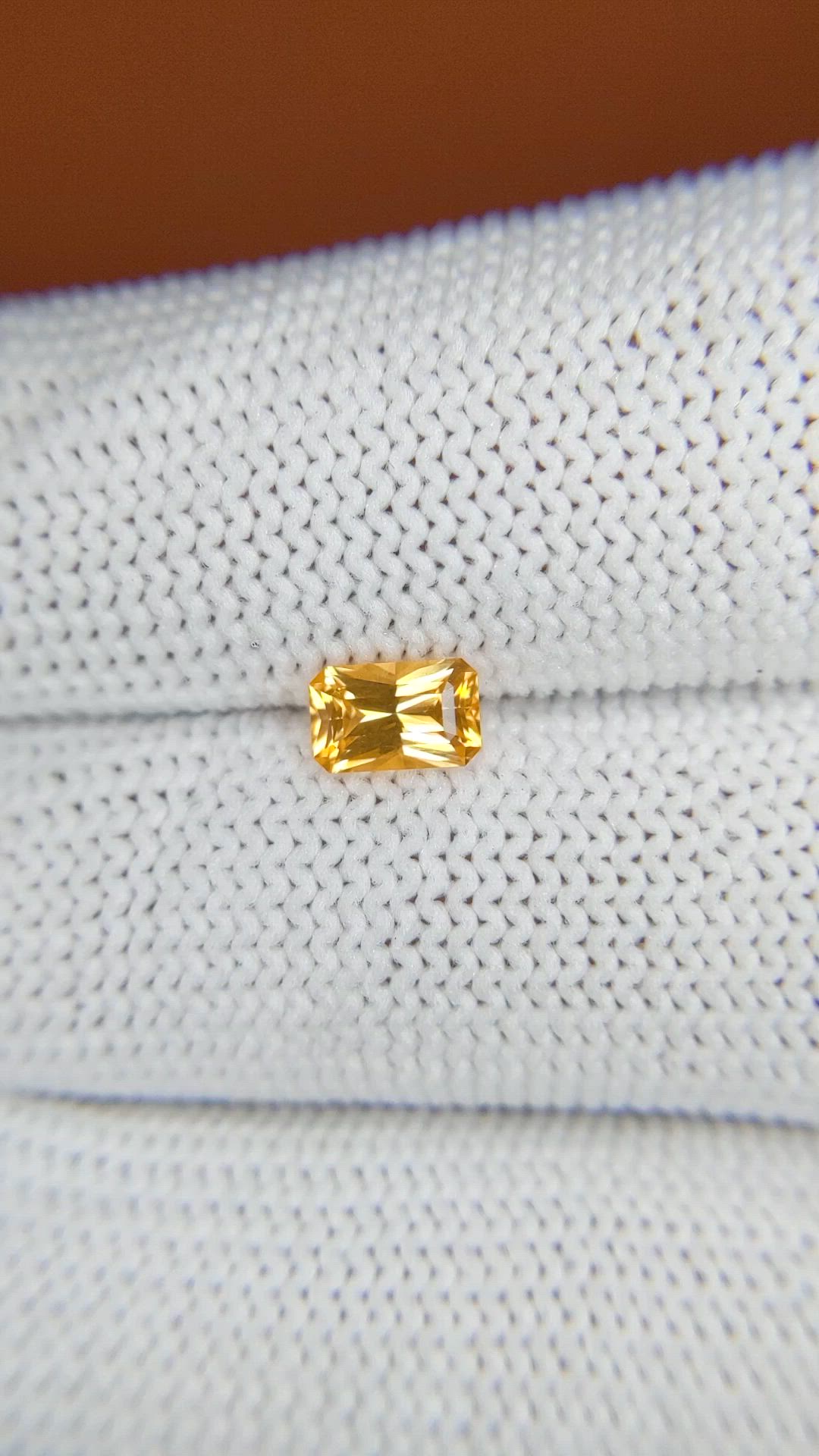 0.64 Ct. Orangish Yellow Sapphire from Ceylon (Sri Lanka) Size Video