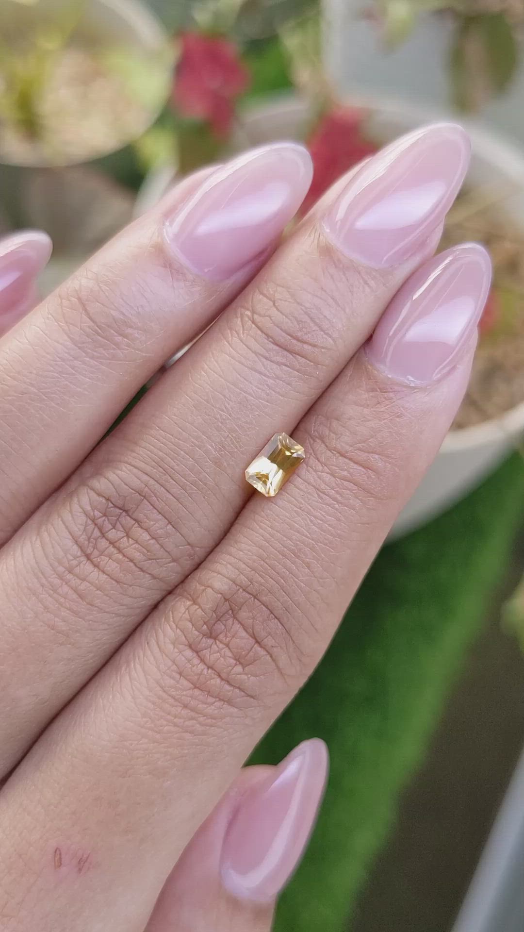 0.64 Ct. Orangish Yellow Sapphire from Ceylon (Sri Lanka) Size Video