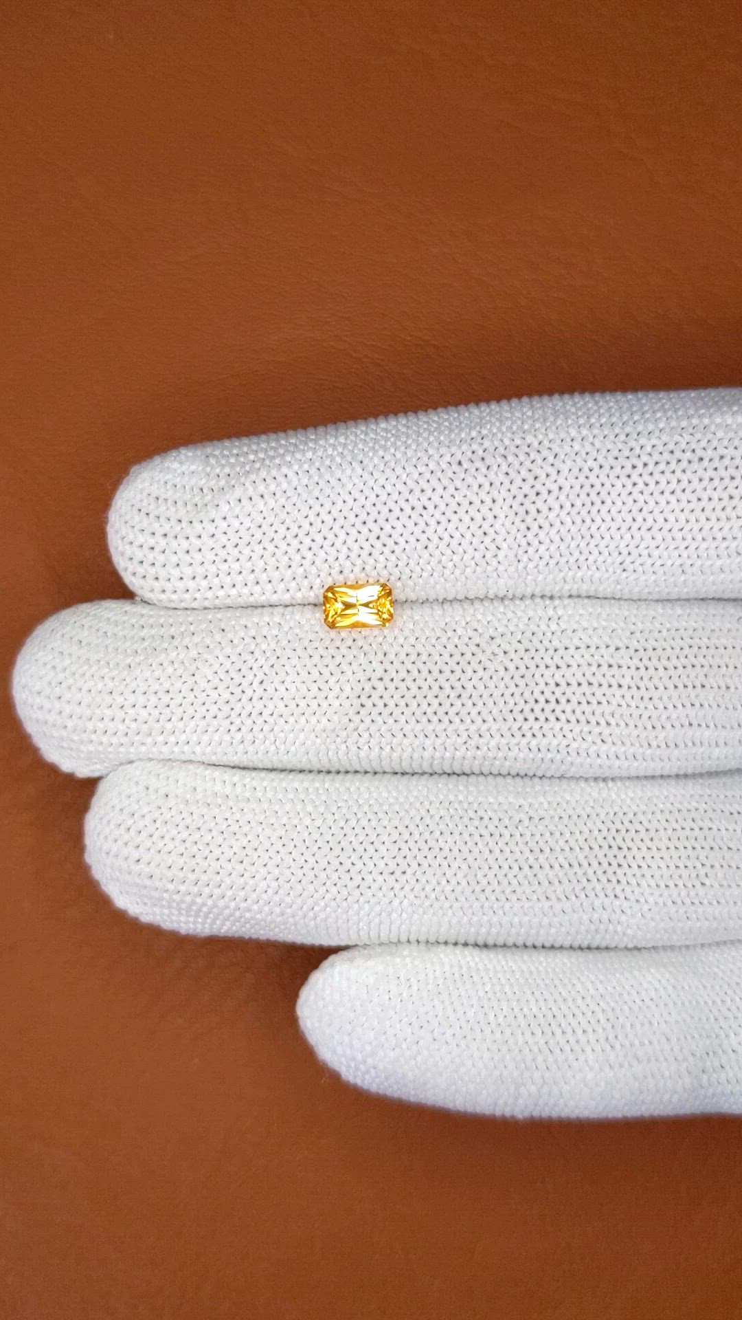 0.64 Ct. Orangish Yellow Sapphire from Ceylon (Sri Lanka) Size Video