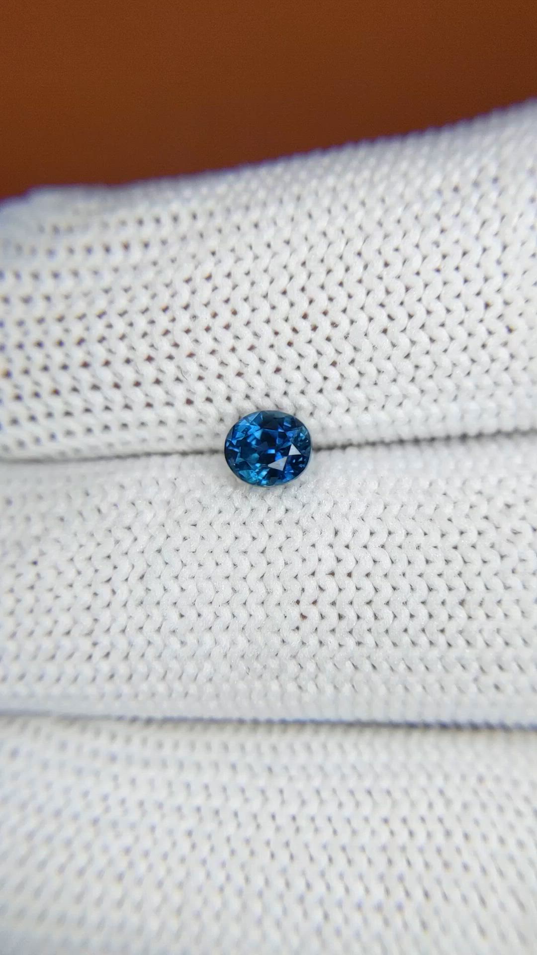 0.63 Ct. Greenish Blue Sapphire from Madagascar Size Video