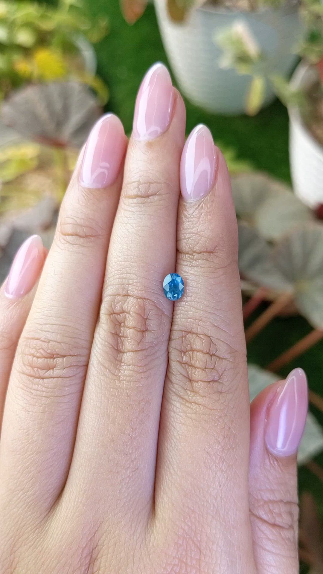 0.64 Ct. Greenish Blue Sapphire from Madagascar Size Video