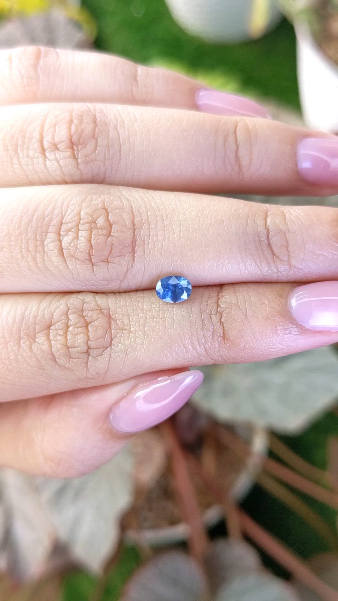 0.64 Ct. Greenish Blue Sapphire from Madagascar Size Video