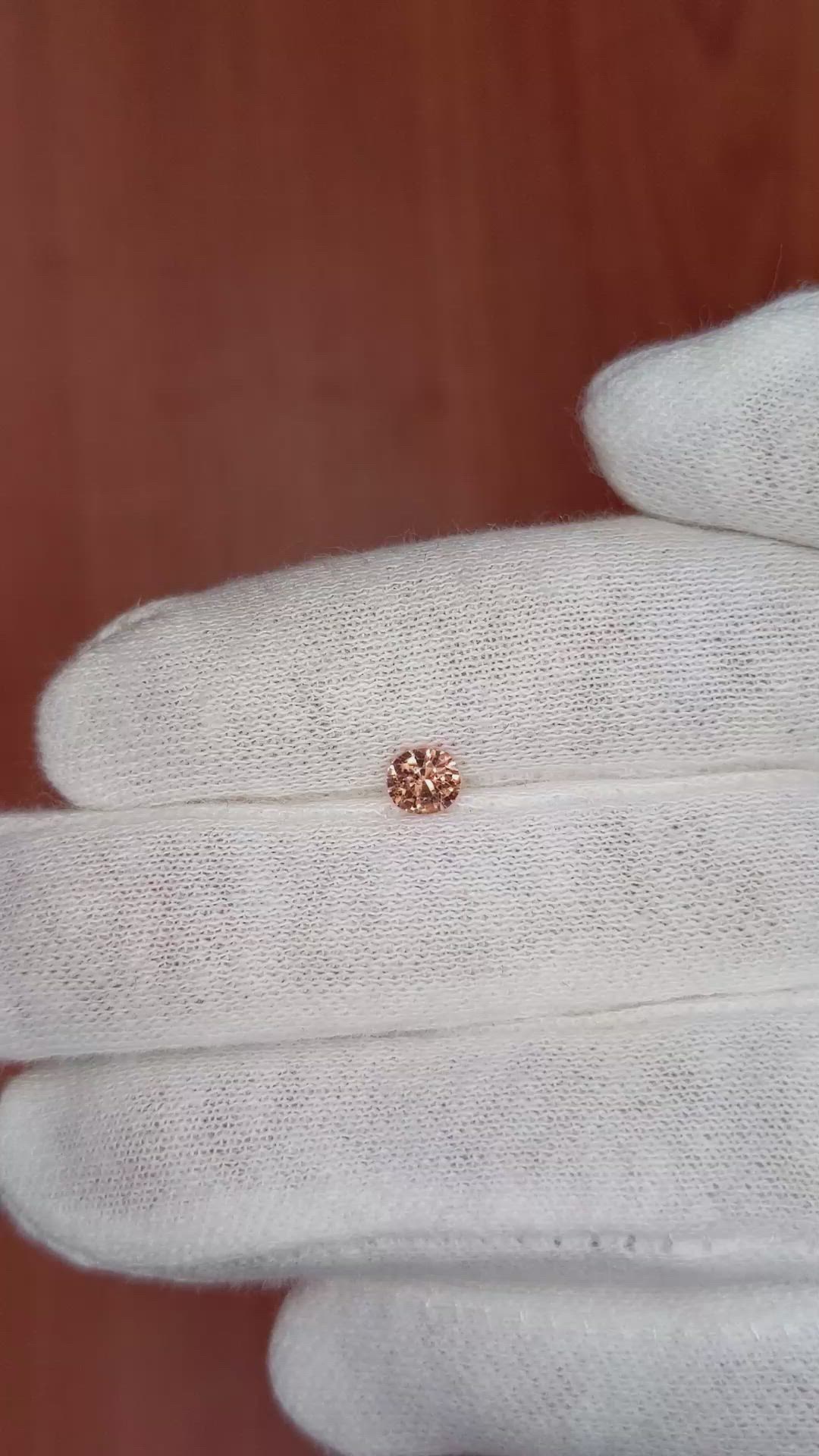 0.44 Ct. Peach Sapphire from Ceylon (Sri Lanka) Size Video