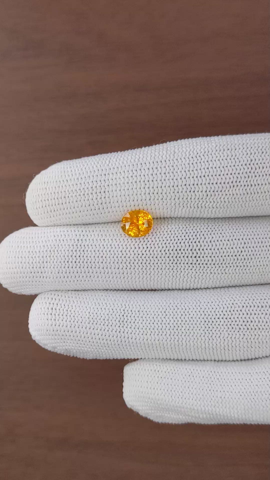 1.63 Ct. Orange Sapphire from Ceylon (Sri Lanka) Size Video