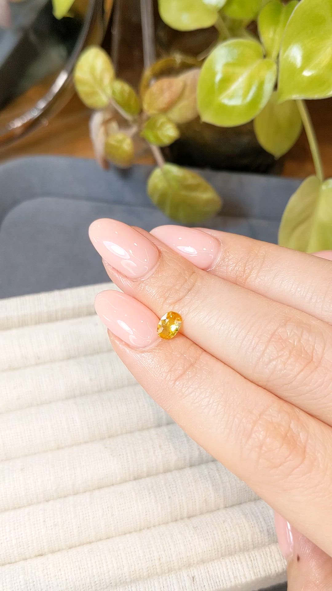 0.60 Ct. Orangish Yellow Sapphire from Thailand Size Video