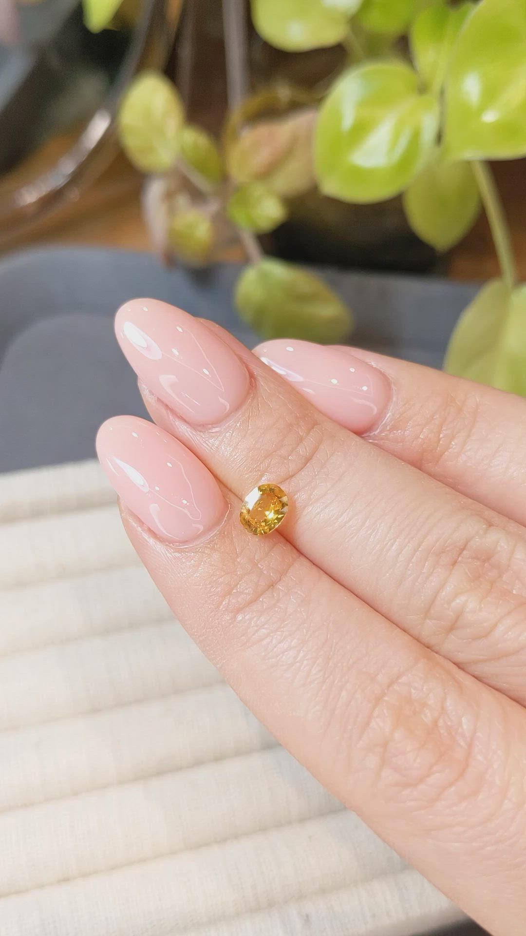 0.65 Ct. Orangish Yellow Sapphire from Thailand Size Video