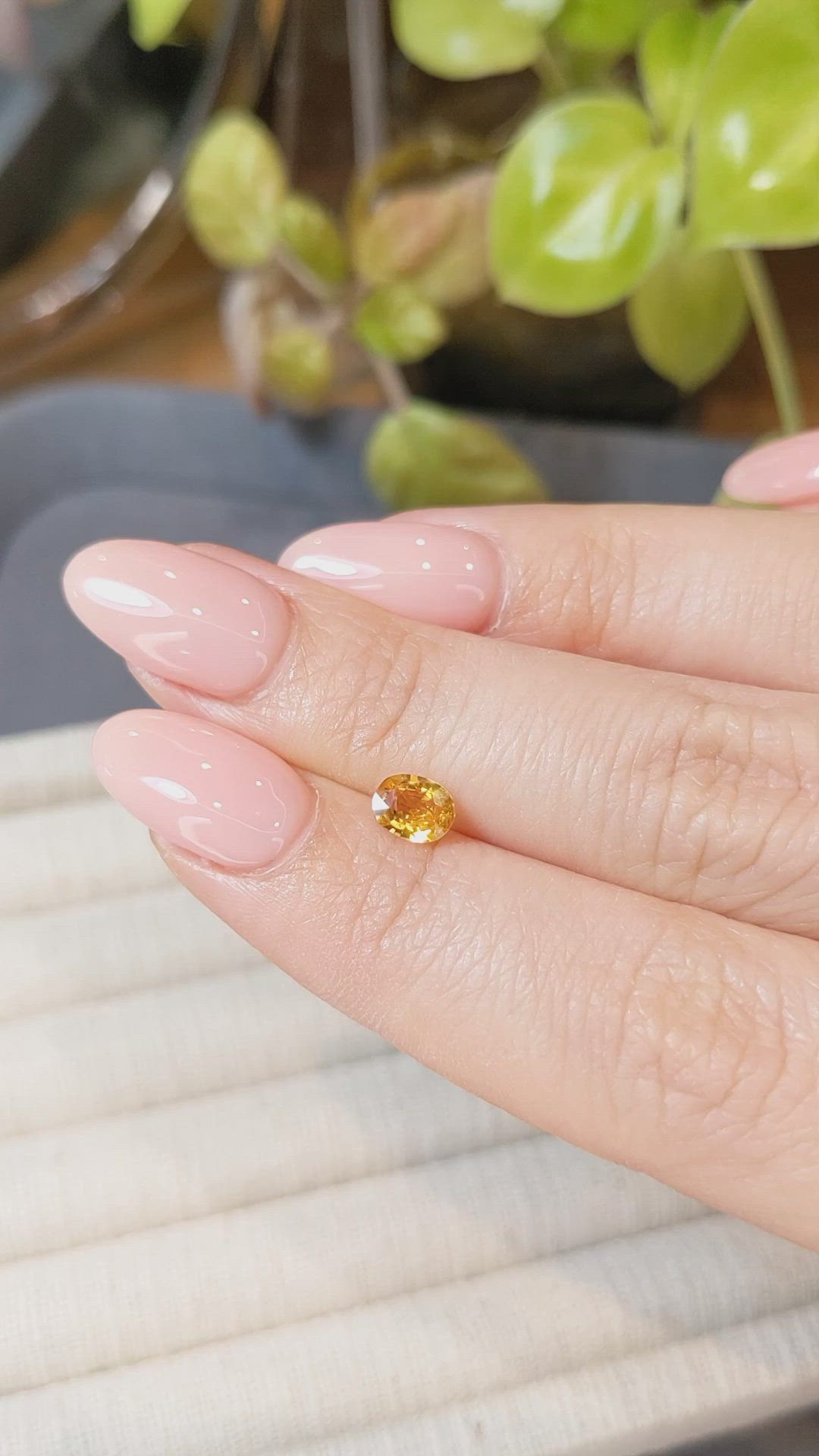 0.65 Ct. Orangish Yellow Sapphire from Thailand Size Video