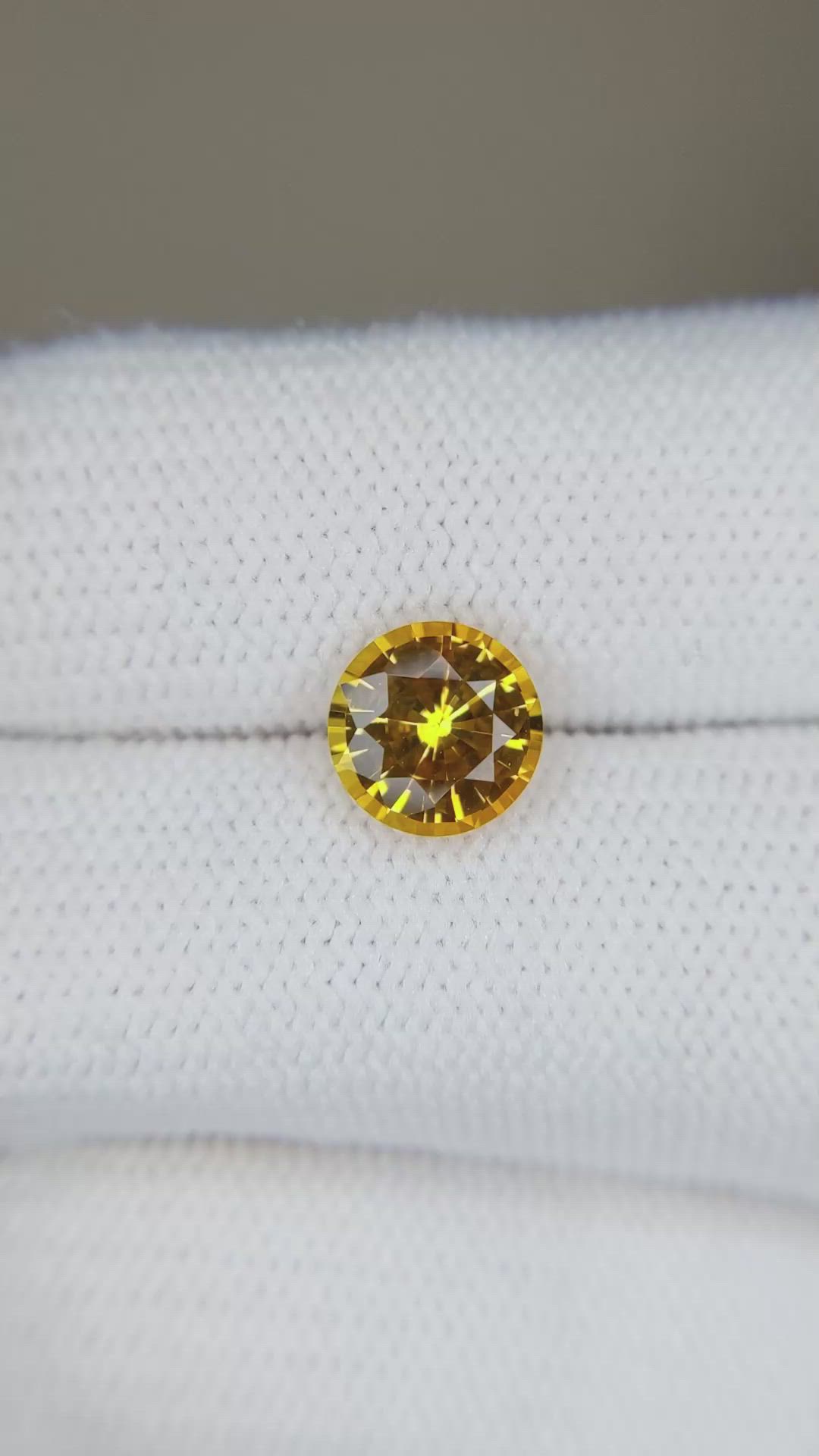 1.86 Ct. Orangish Yellow Sapphire from Ceylon (Sri Lanka) Size Video