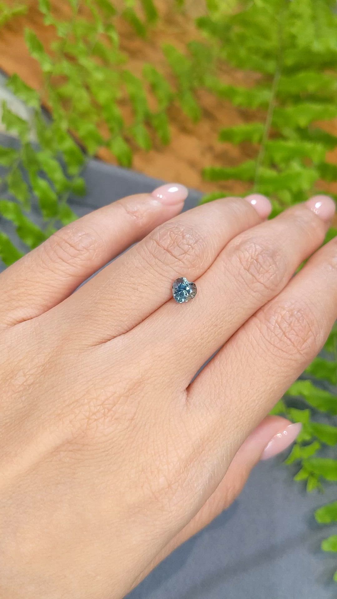 0.91 Ct. Bluish Green Sapphire from Montana Size Video