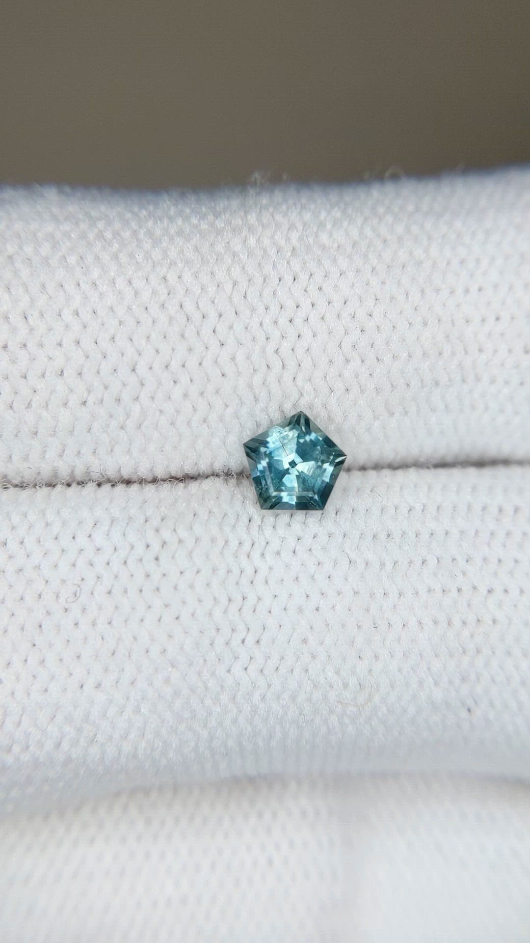 0.55 Ct. Bluish Green Sapphire from Montana Size Video