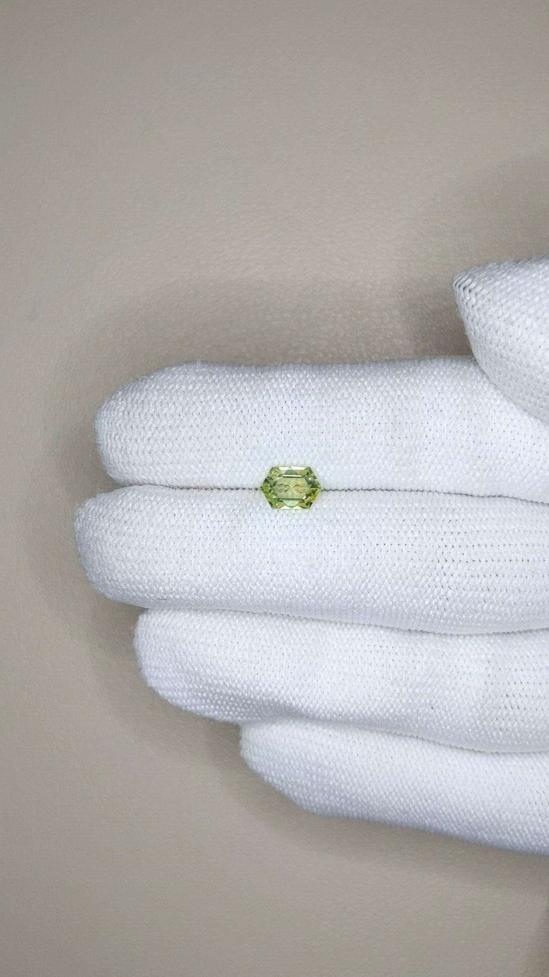 0.86 Ct. Yellowish Green Sapphire from Montana Size Video