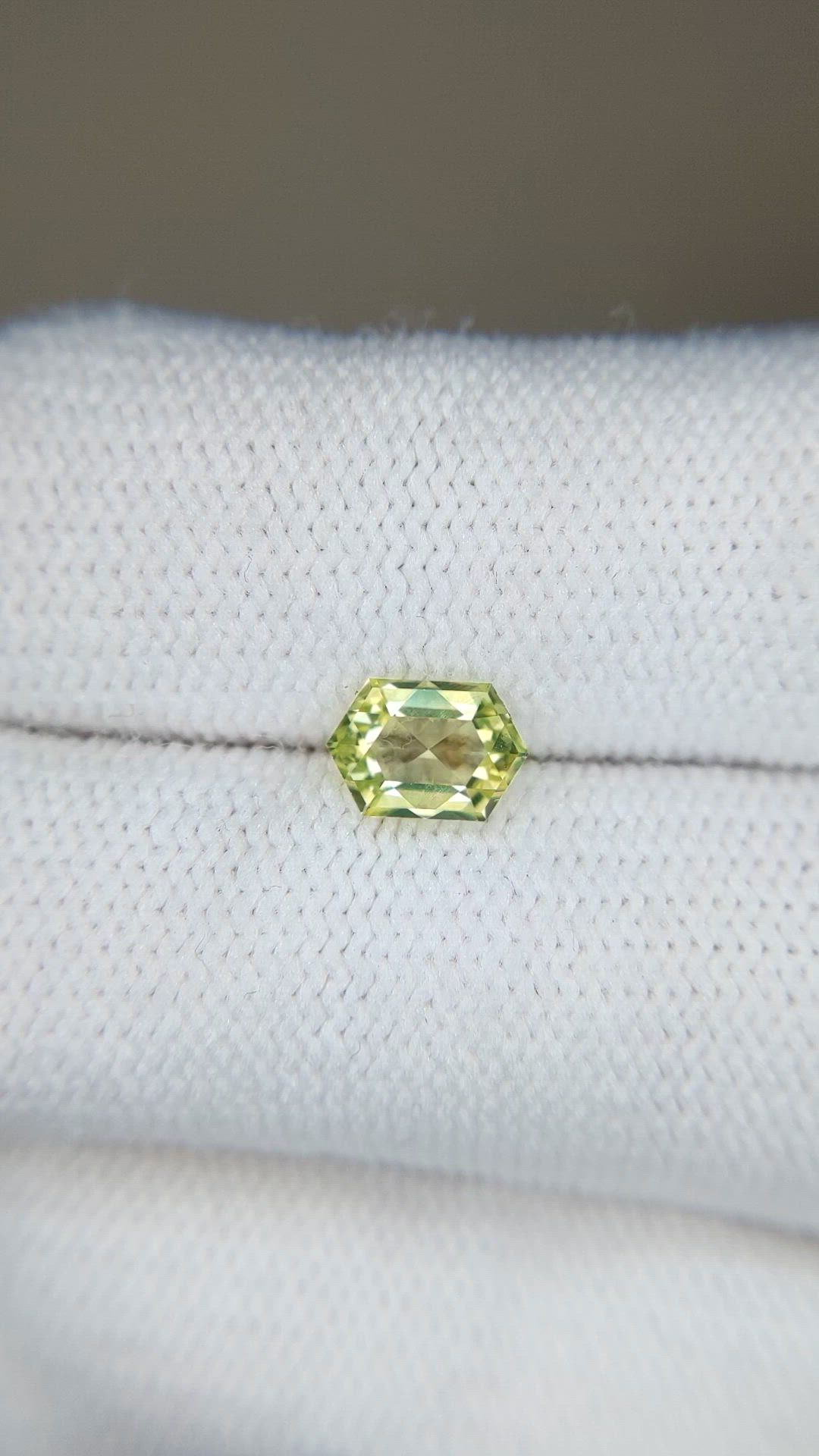0.86 Ct. Yellowish Green Sapphire from Montana Size Video