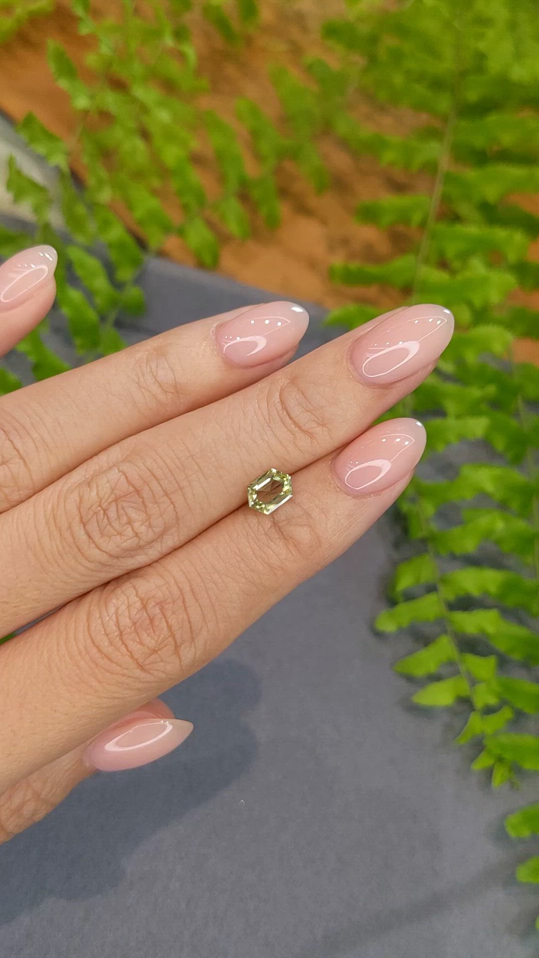 0.86 Ct. Yellowish Green Sapphire from Montana Size Video