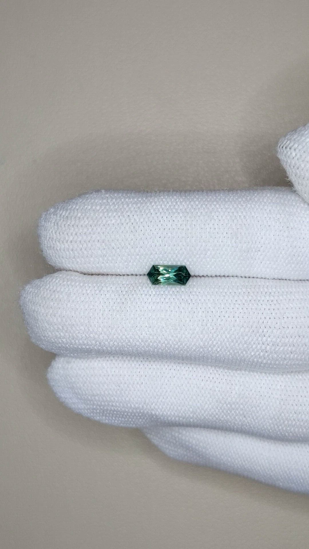 0.71 Ct. Bluish Green Sapphire from Montana Size Video