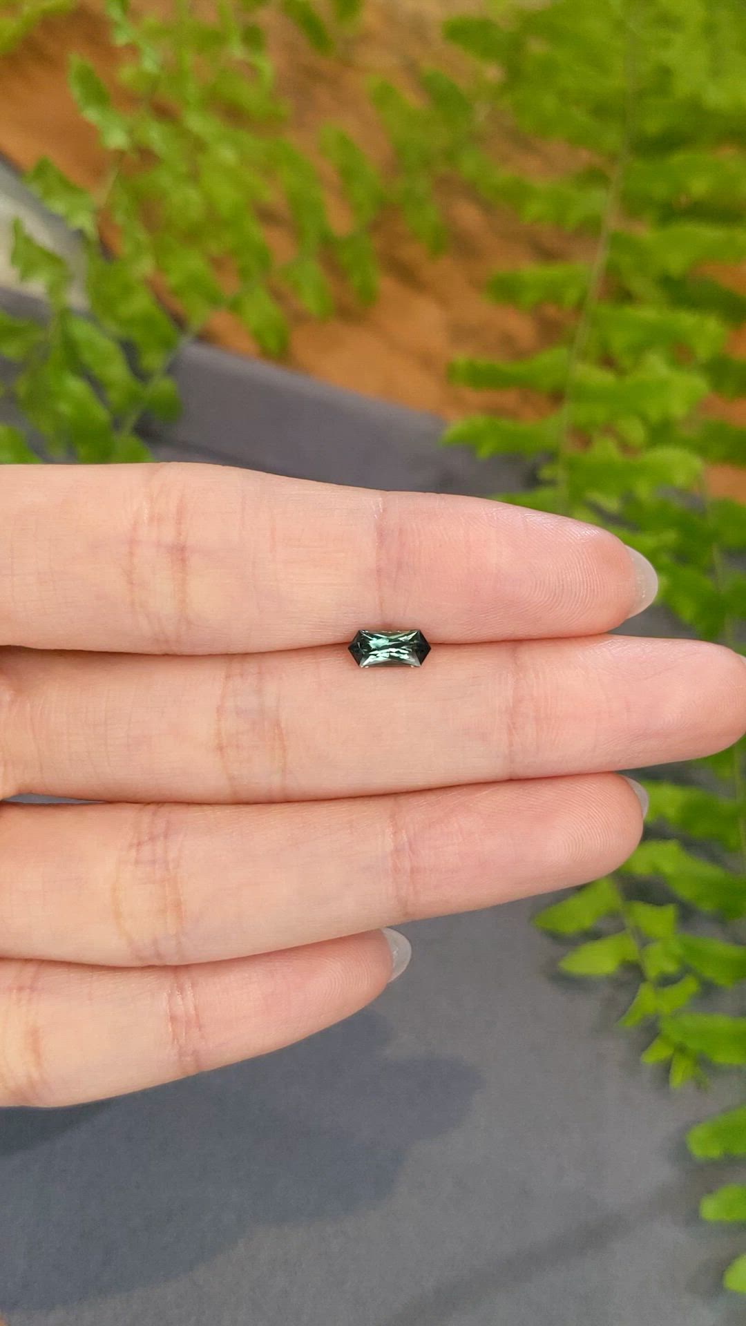 0.71 Ct. Bluish Green Sapphire from Montana Size Video