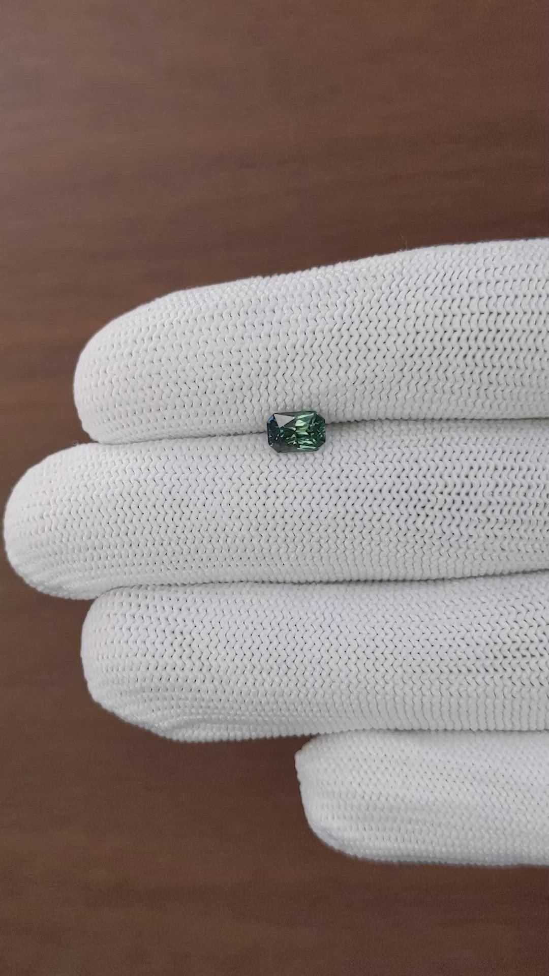 0.91 Ct. Bluish Green Sapphire from Madagascar Size Video
