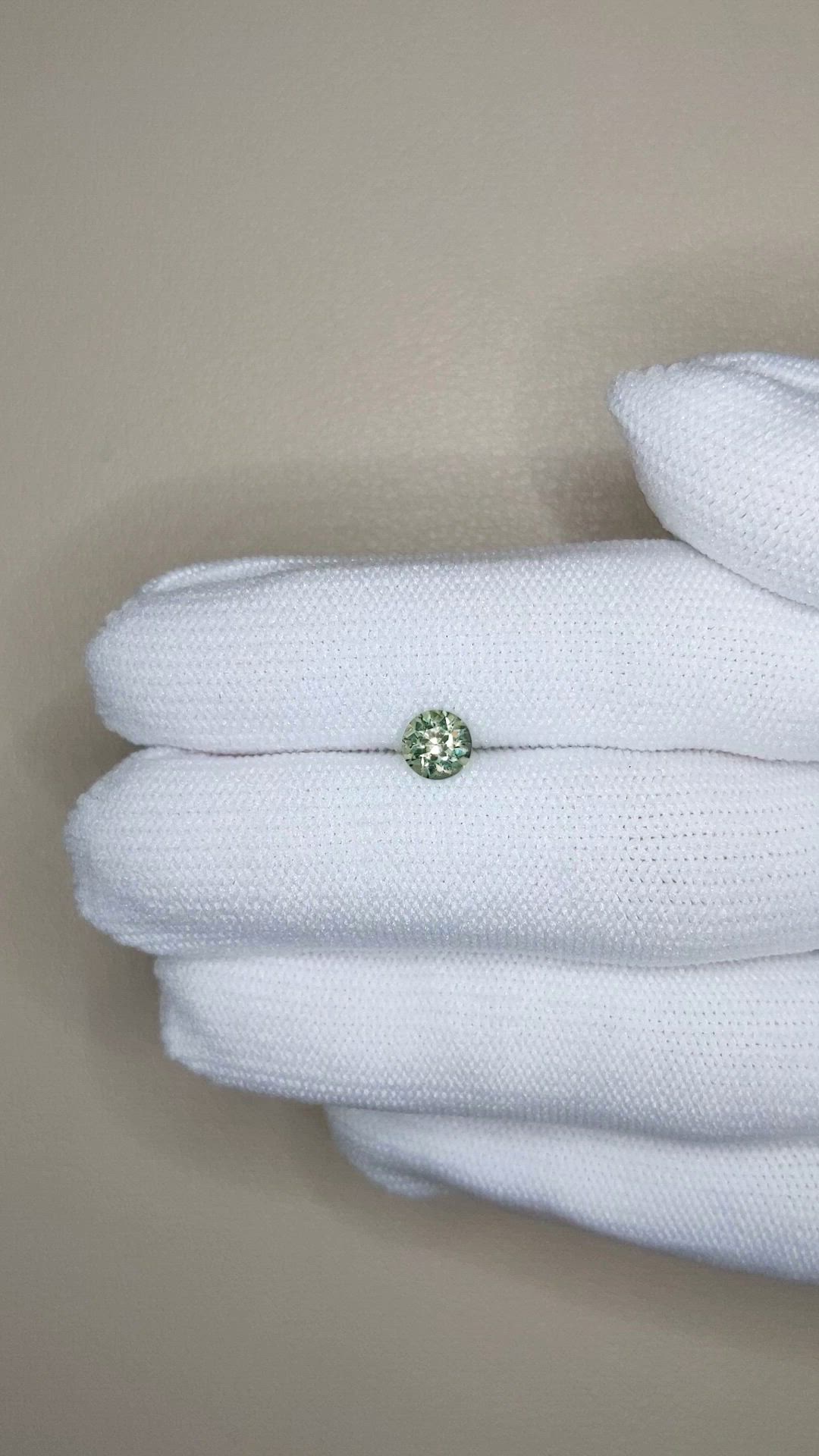 0.76 Ct. Yellowish Green Sapphire from Ceylon (Sri Lanka) Size Video