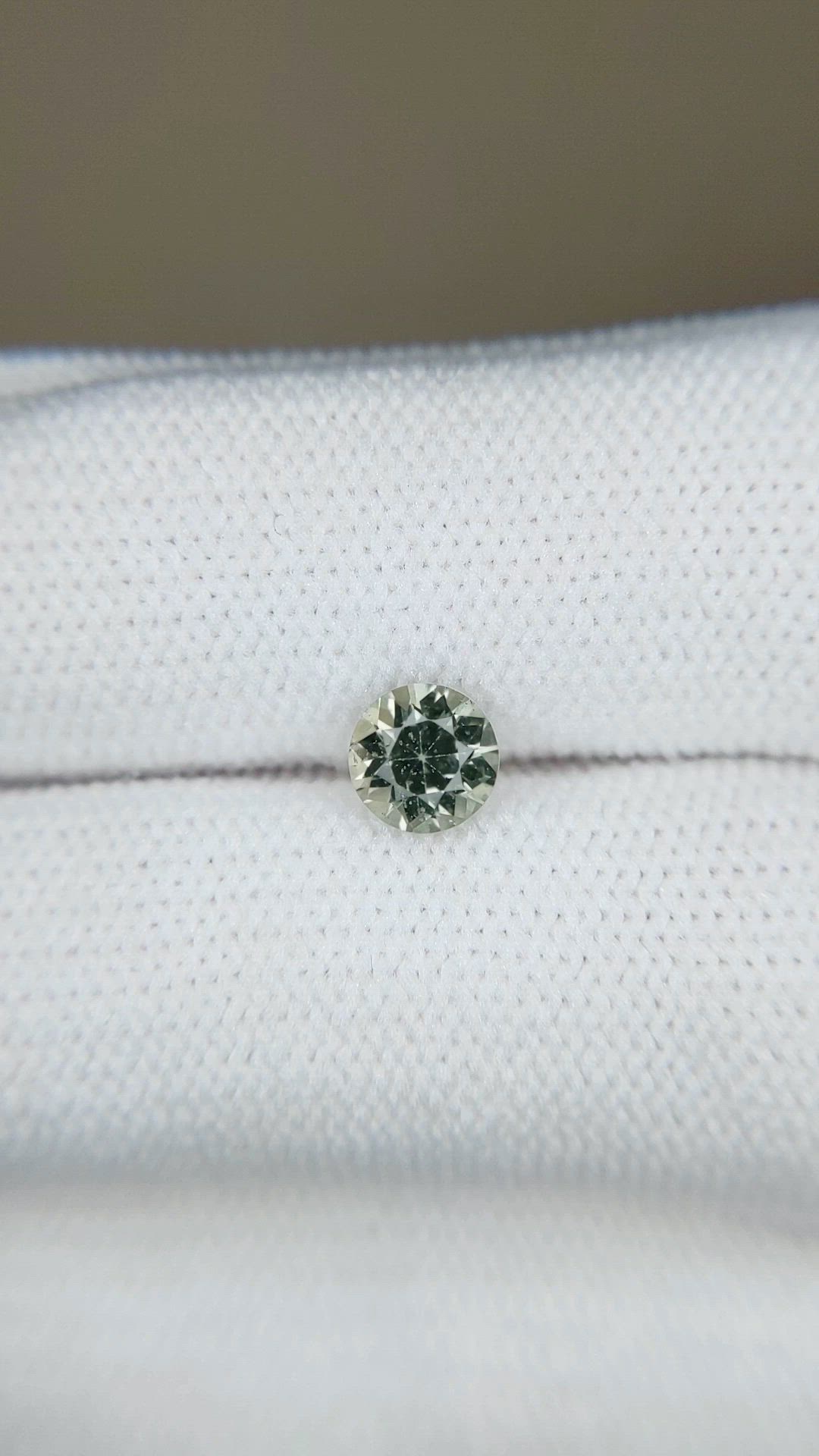 0.76 Ct. Yellowish Green Sapphire from Ceylon (Sri Lanka) Size Video