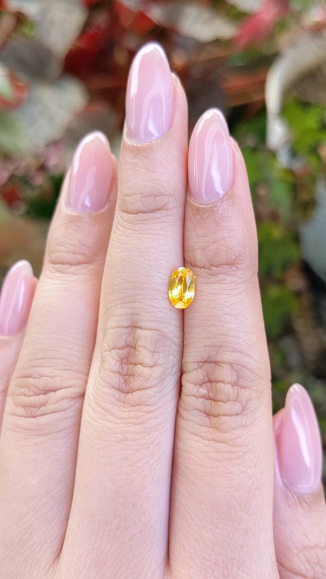 0.80 Ct. Orangish Yellow Sapphire from Ceylon (Sri Lanka) Size Video