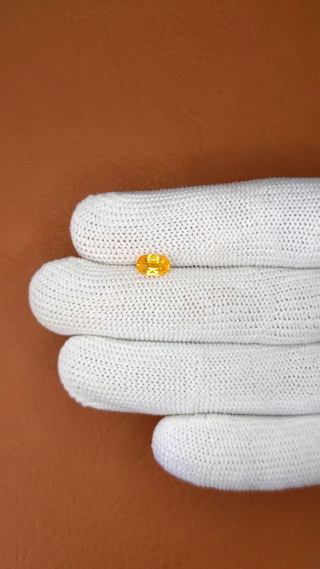0.80 Ct. Orangish Yellow Sapphire from Ceylon (Sri Lanka) Size Video