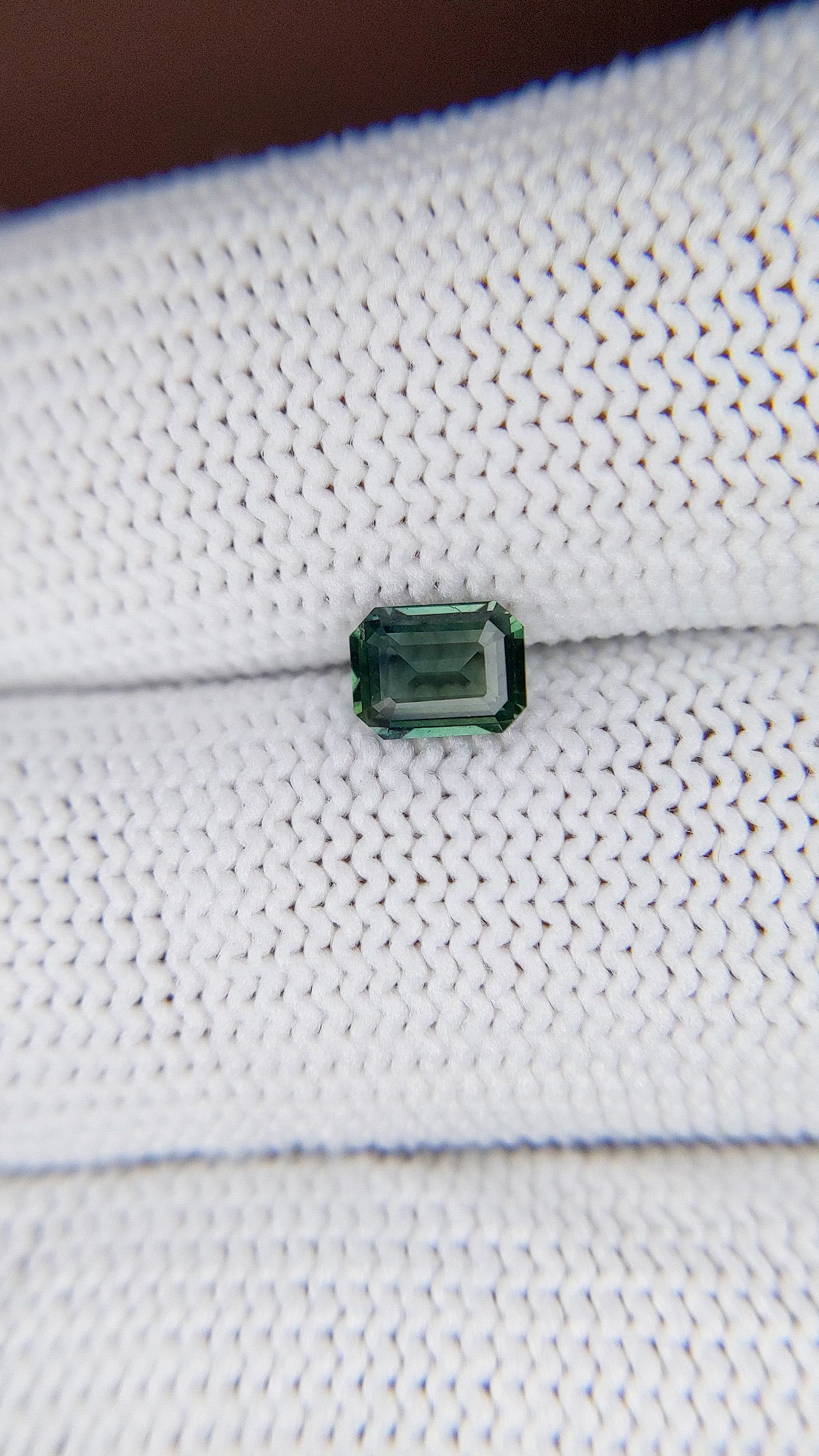 0.61 Ct. Bluish Green Sapphire from Madagascar Size Video