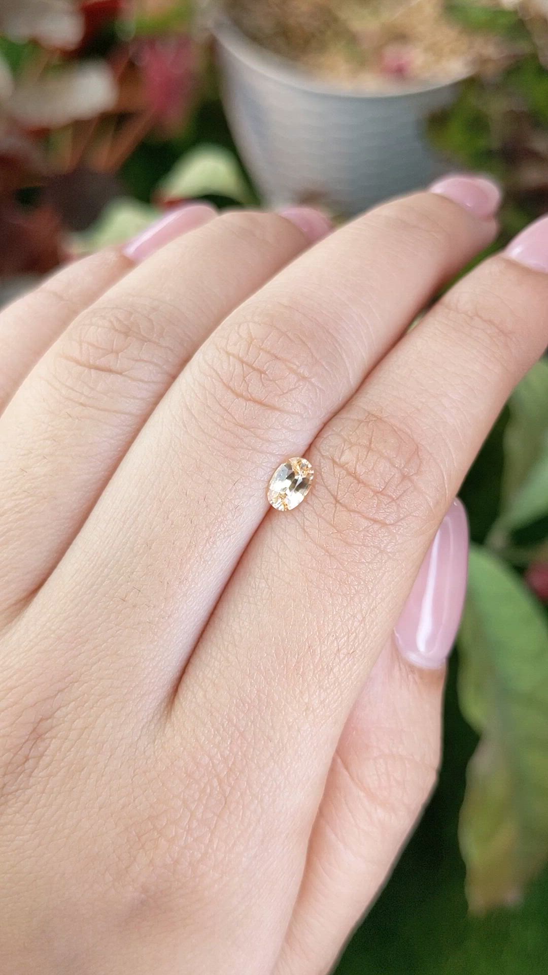 0.50 Ct. Peach Sapphire from Ceylon (Sri Lanka) Size Video