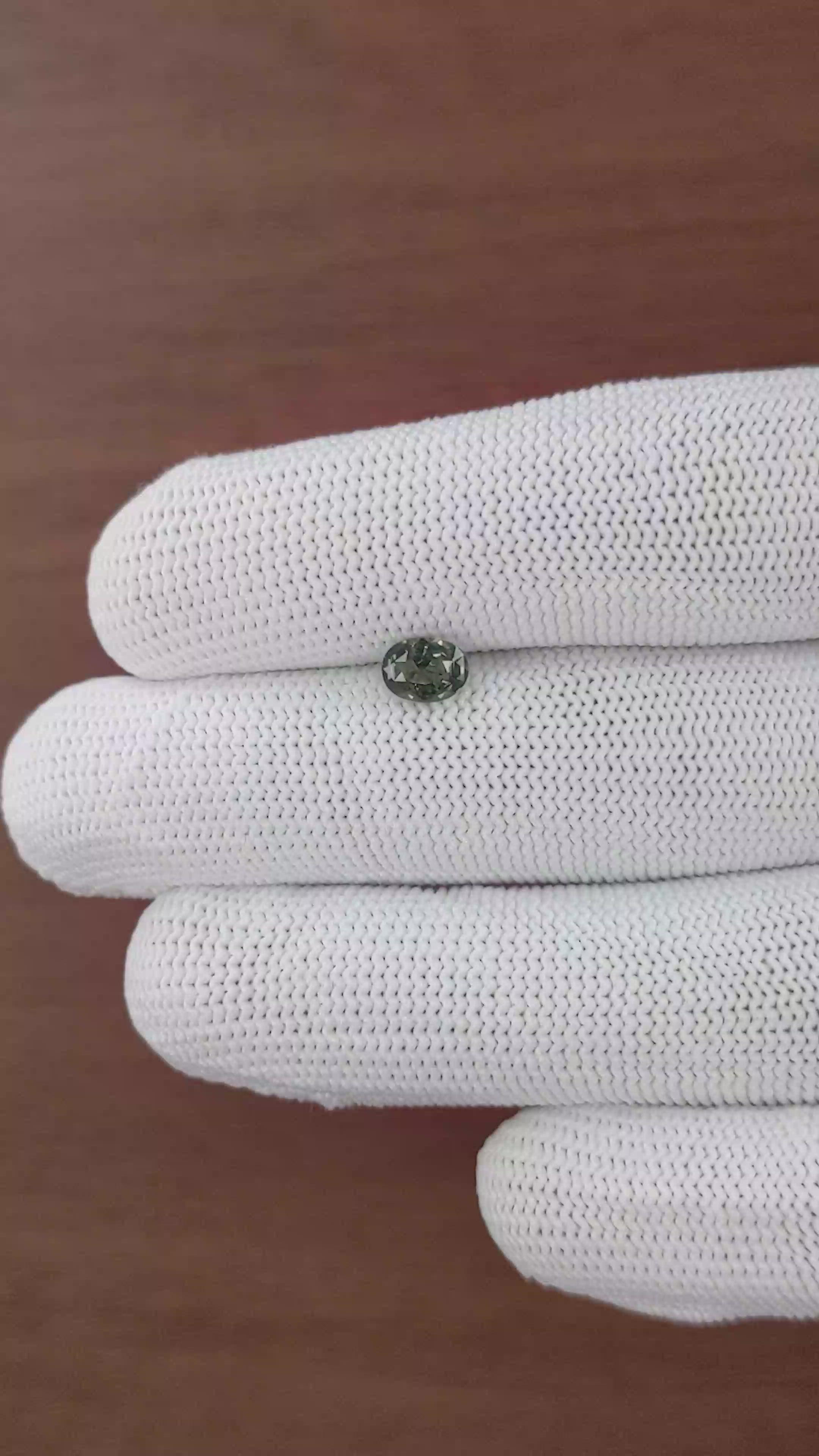 1.01 Ct. Brownish Green Sapphire from Tanzania Size Video