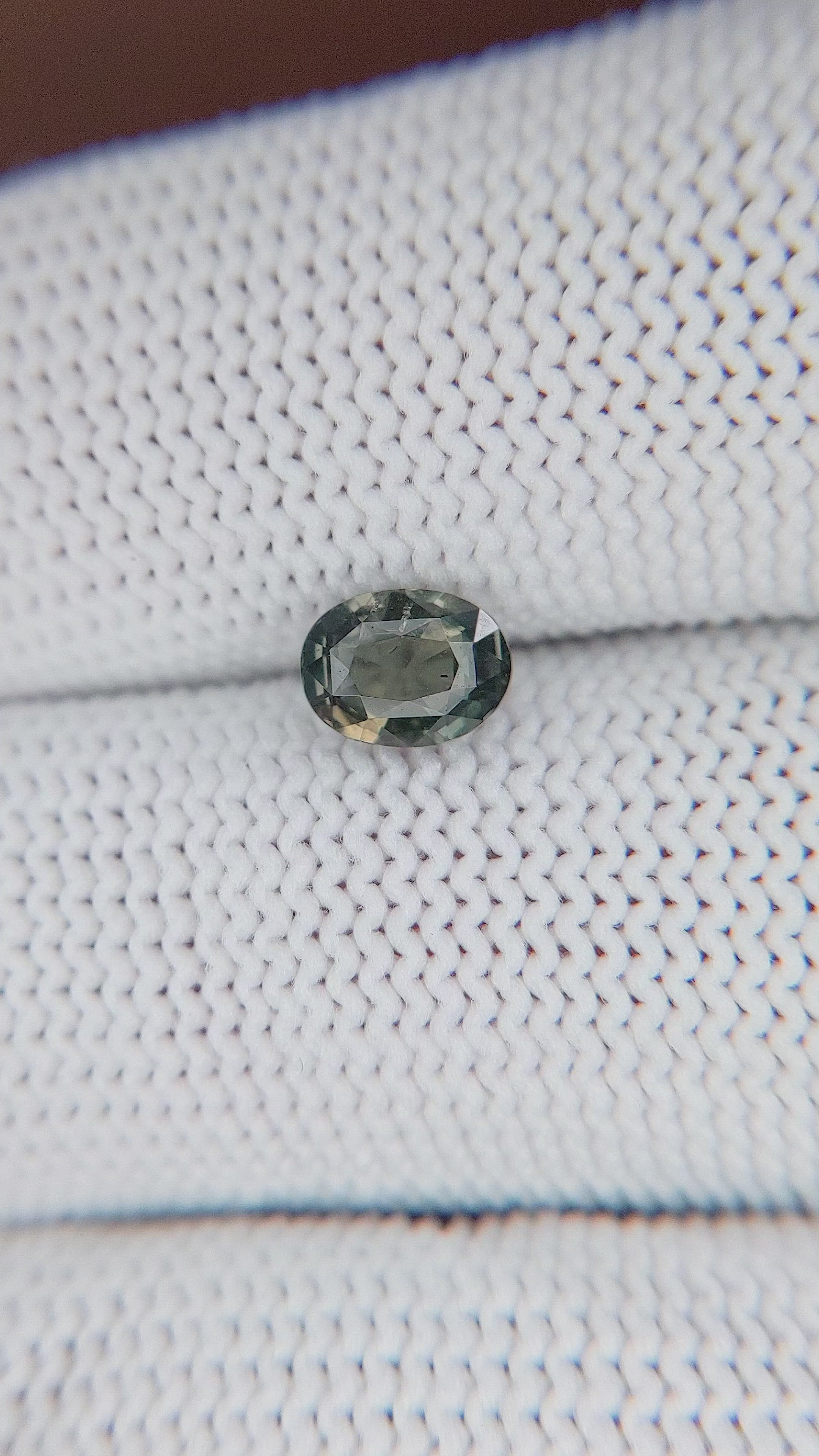 1.01 Ct. Brownish Green Sapphire from Tanzania Size Video