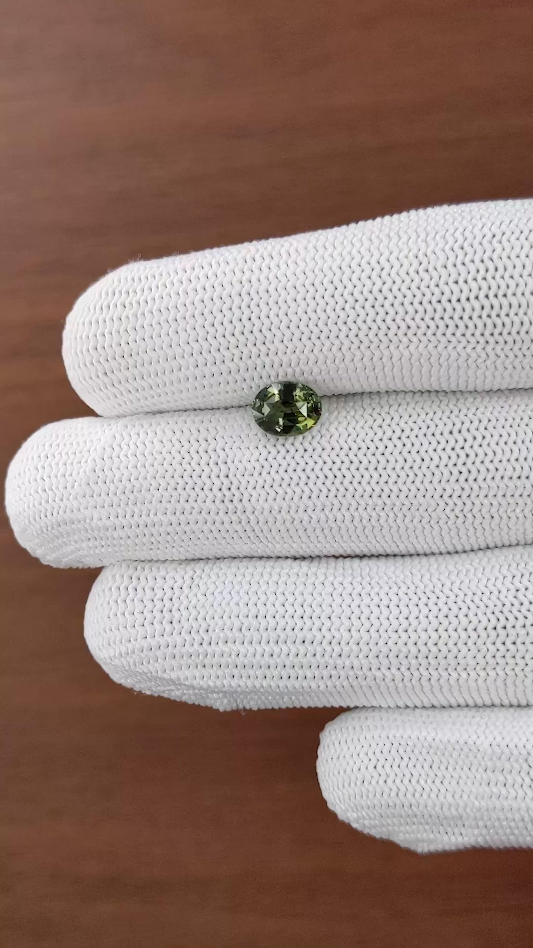 1.56 Ct. Brownish Green Sapphire from Tanzania Size Video
