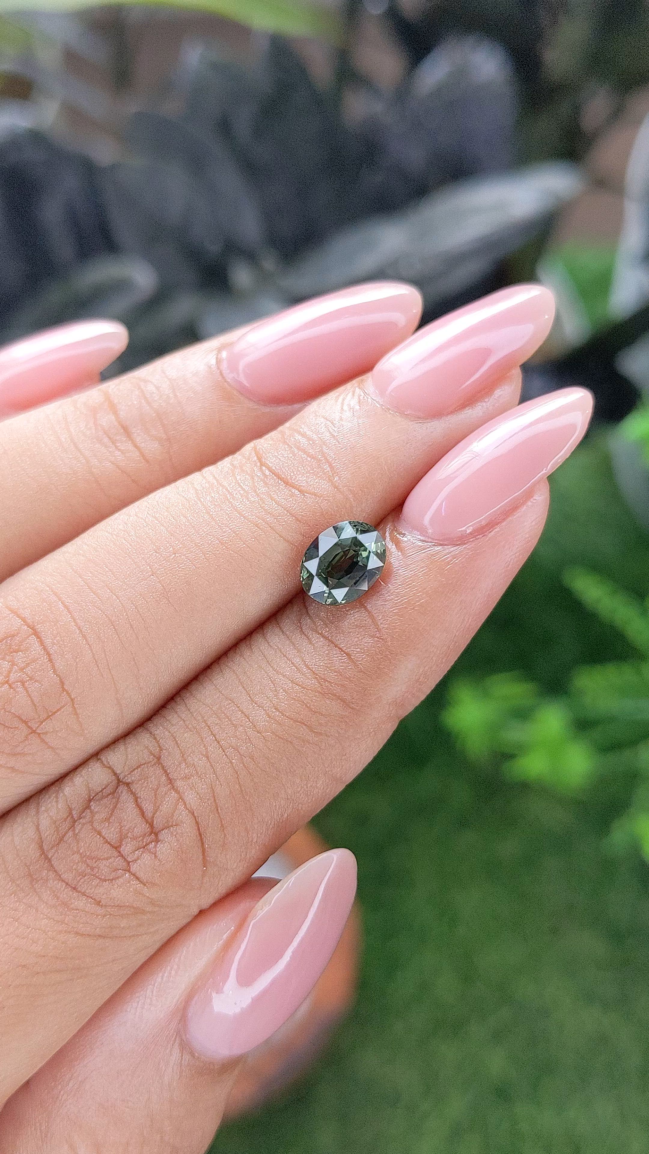 1.56 Ct. Brownish Green Sapphire from Tanzania Size Video