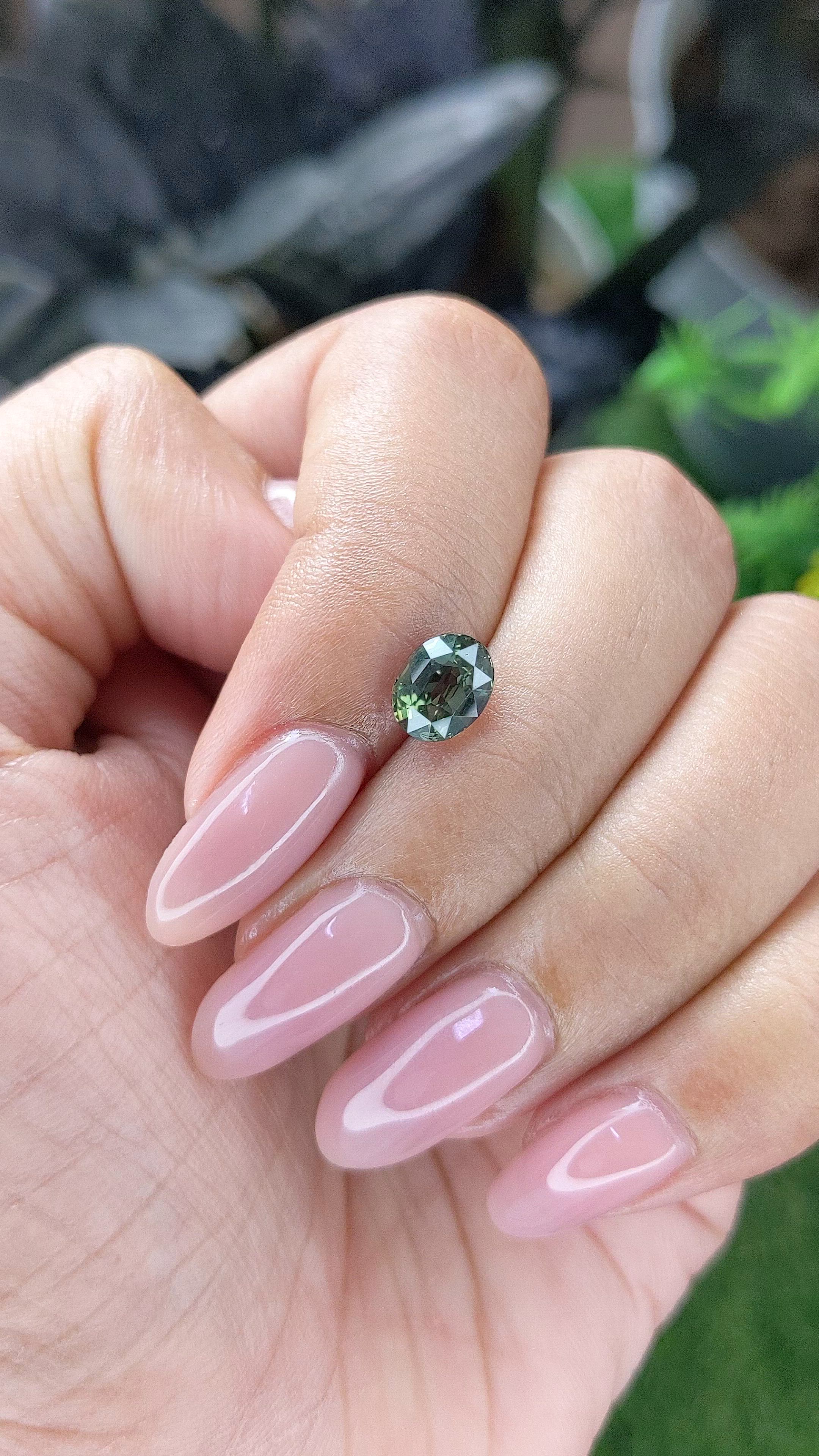 1.56 Ct. Brownish Green Sapphire from Tanzania Size Video