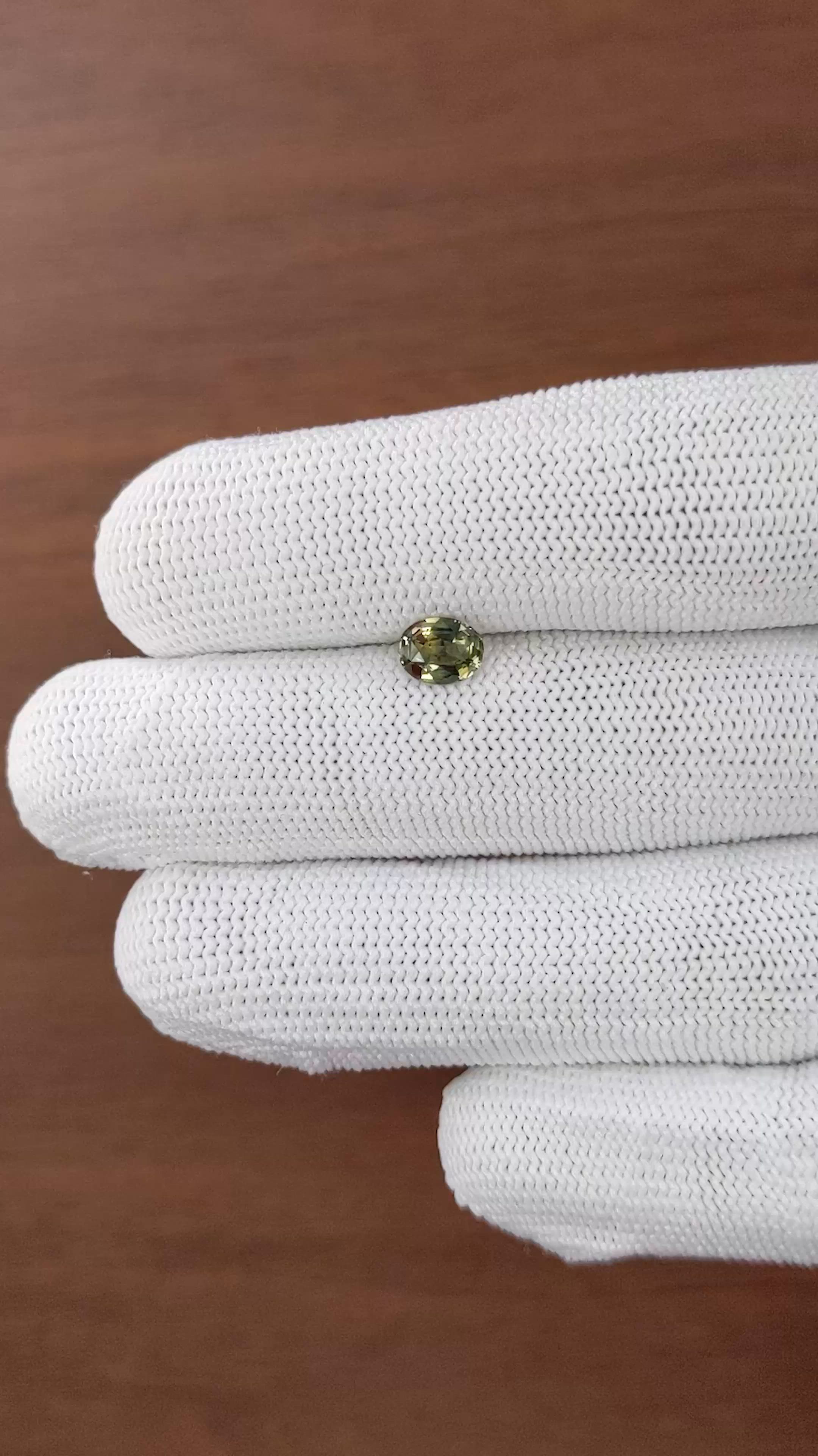 0.88 Ct. Yellowish Green Sapphire from Tanzania Size Video