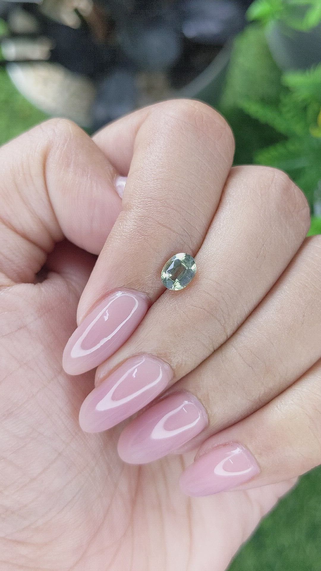 0.87 Ct. Yellowish Green Sapphire from Tanzania Size Video