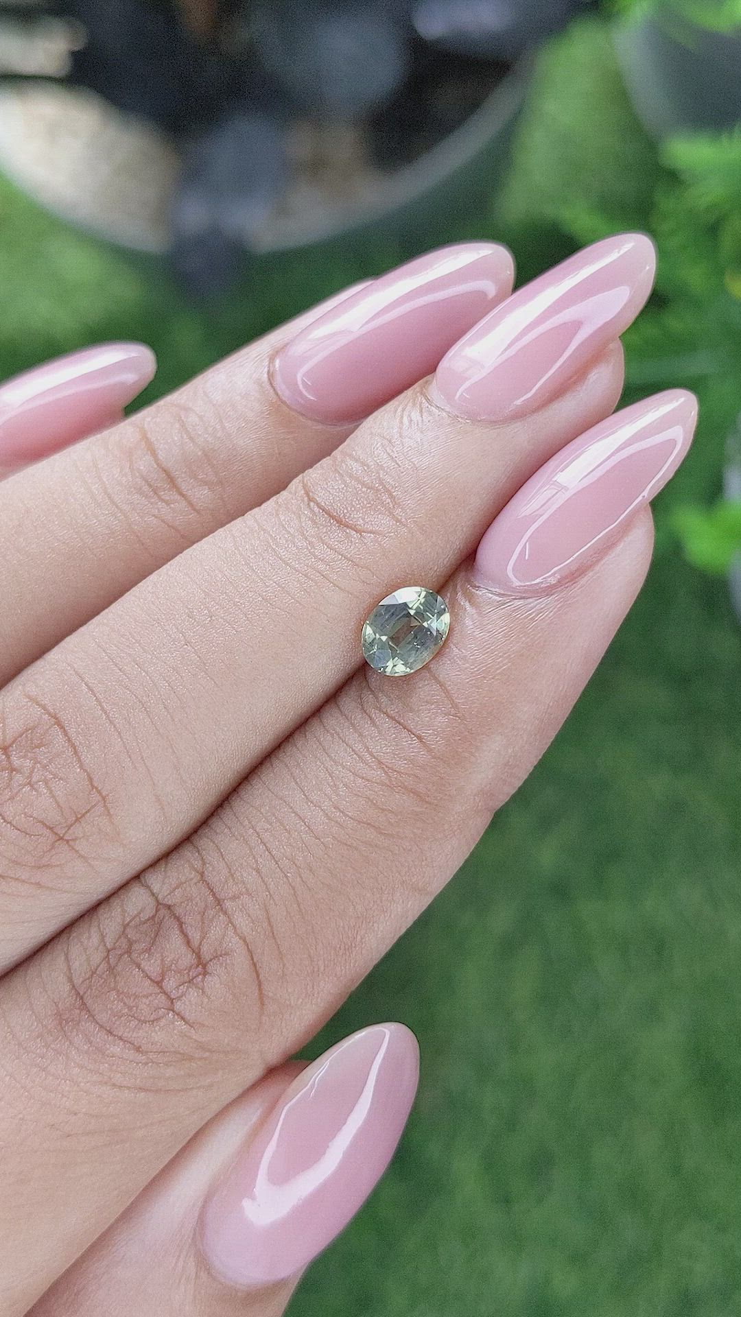0.87 Ct. Yellowish Green Sapphire from Tanzania Size Video