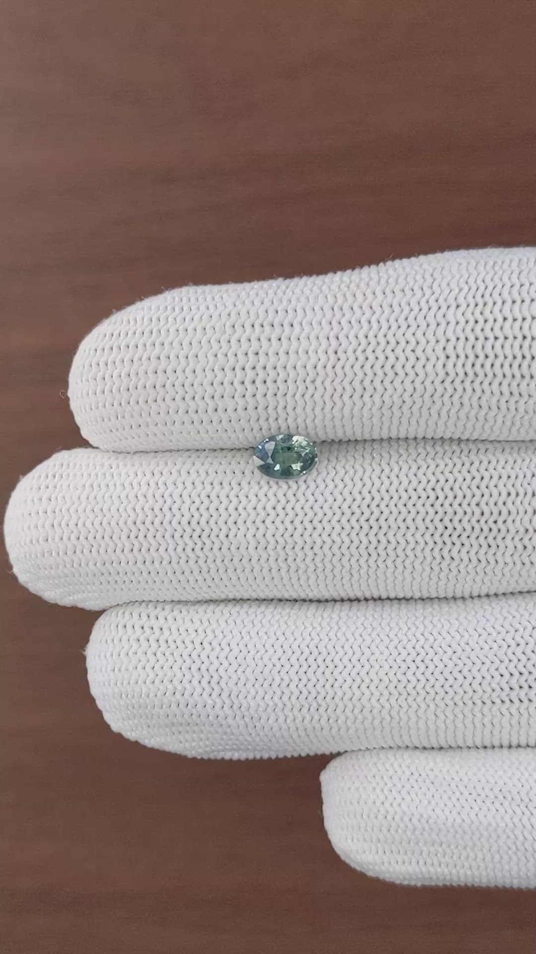 0.86 Ct. Bluish Green Sapphire from Madagascar Size Video