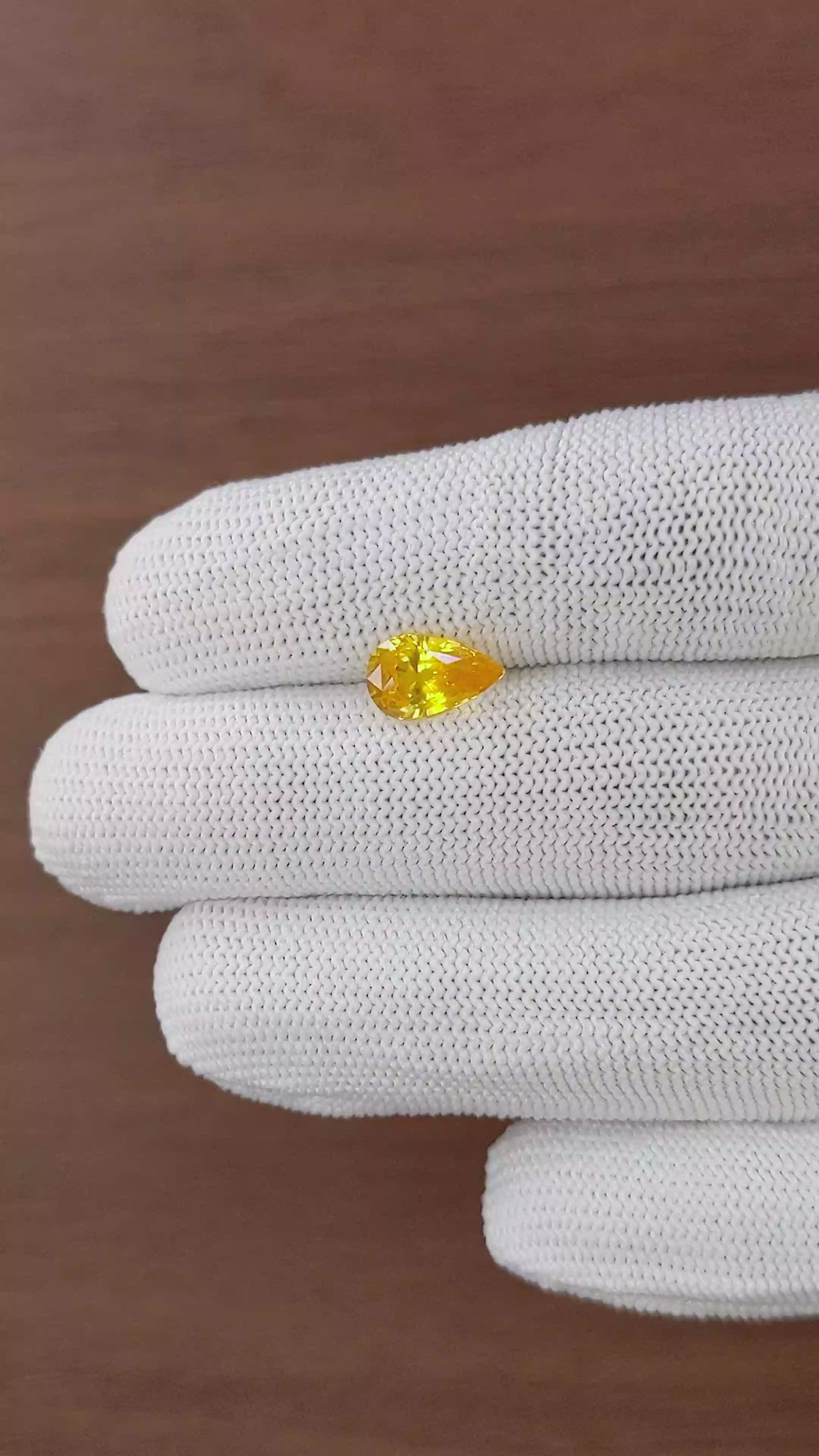 2.13 Ct. Orangish Yellow Sapphire from Ceylon (Sri Lanka) Size Video
