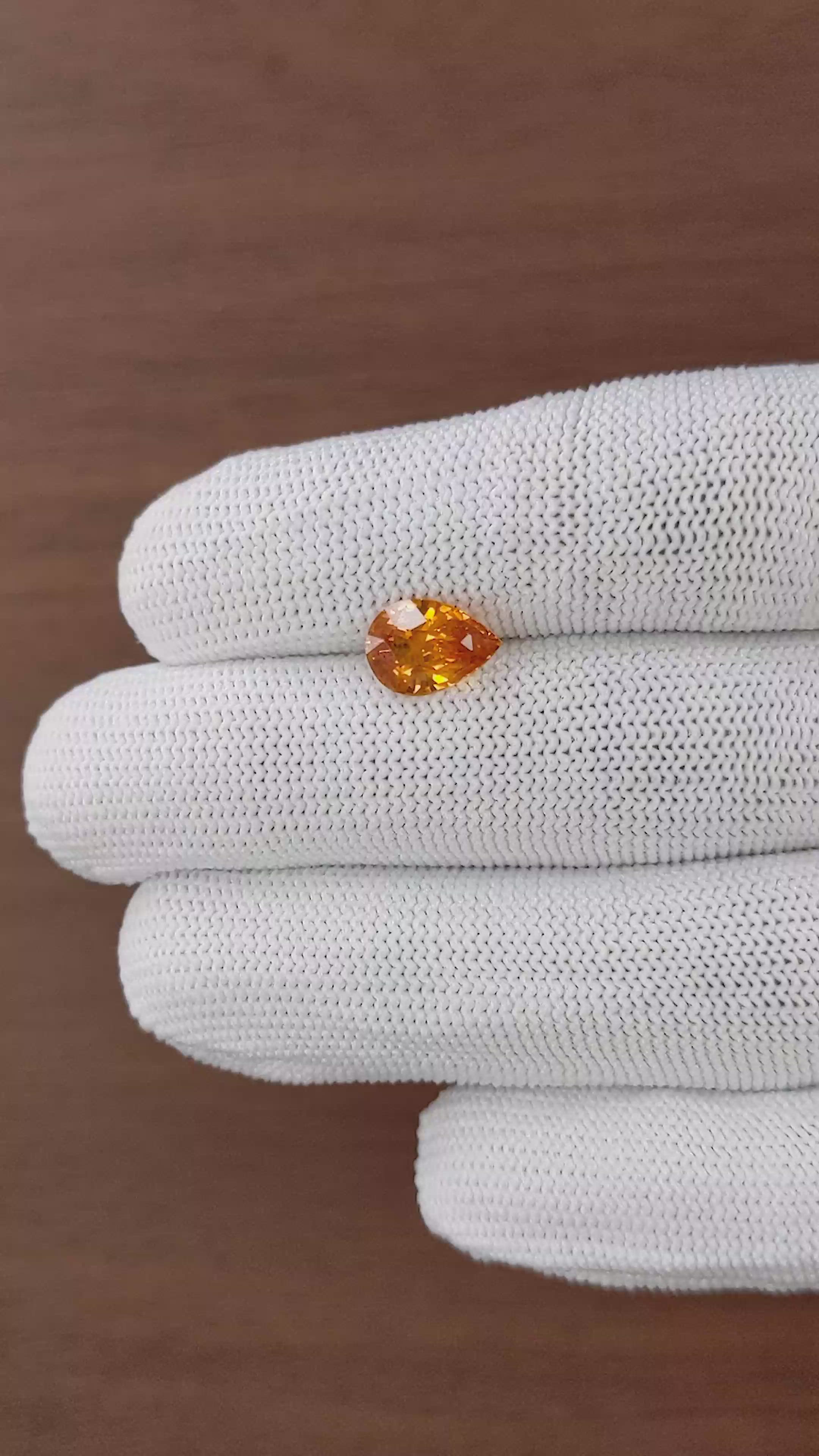 2.52 Ct. Yellowish Orange Sapphire from Ceylon (Sri Lanka) Size Video