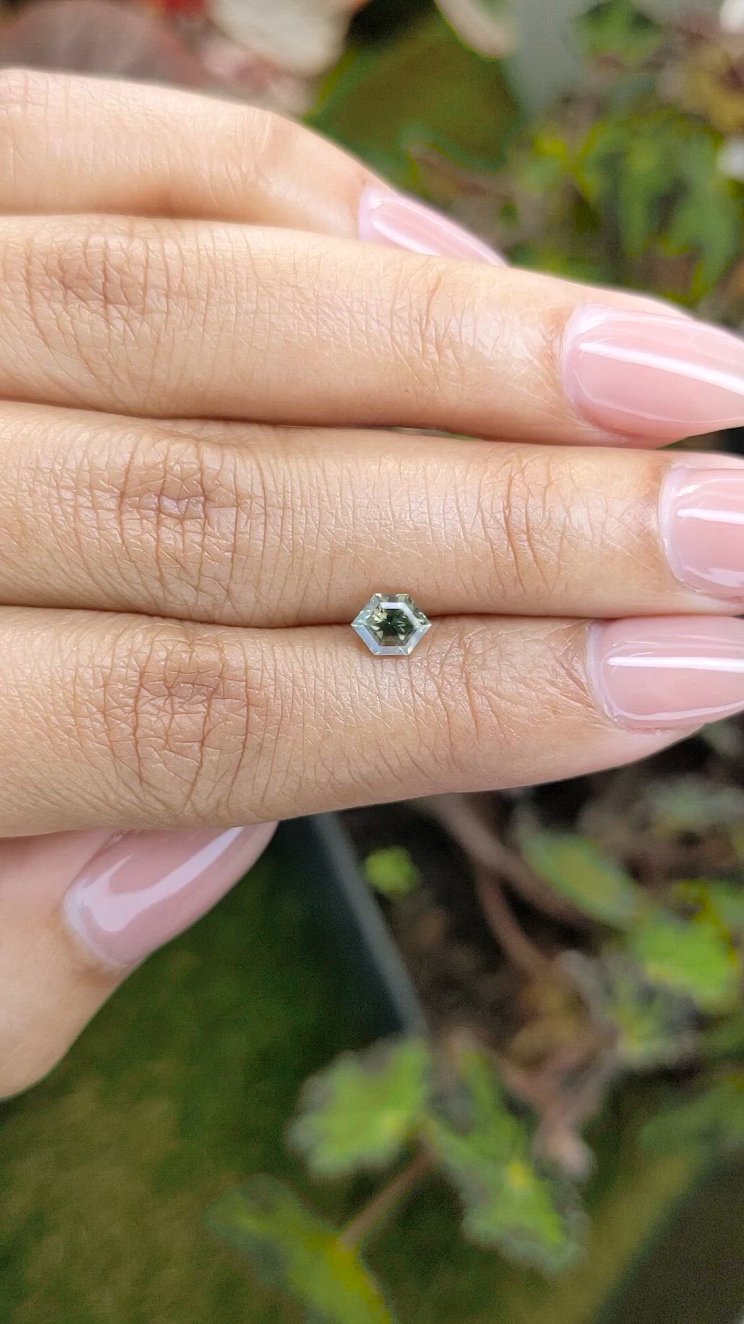 0.74 Ct. Yellowish Green Sapphire from Ceylon (Sri Lanka) Size Video