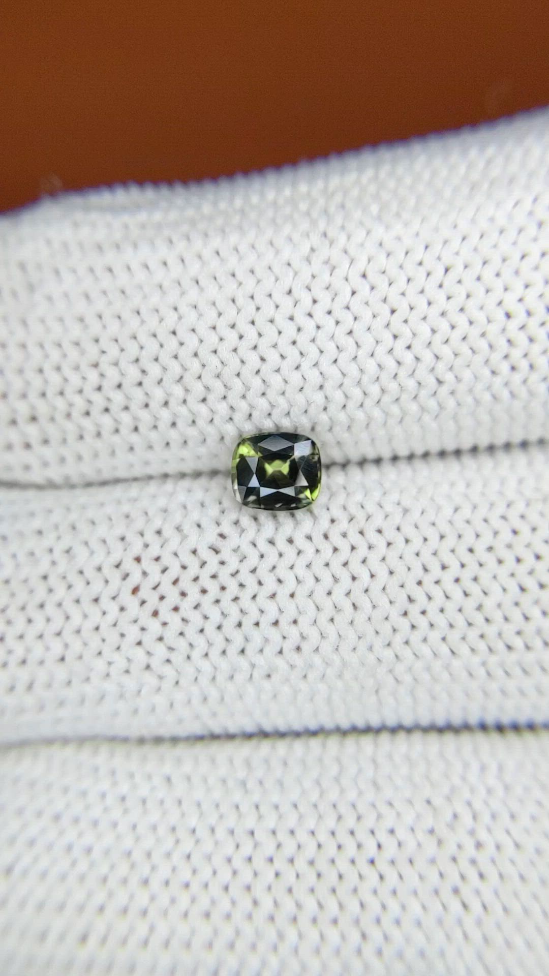 0.59 Ct. Yellowish Green Sapphire from Ceylon (Sri Lanka) Size Video