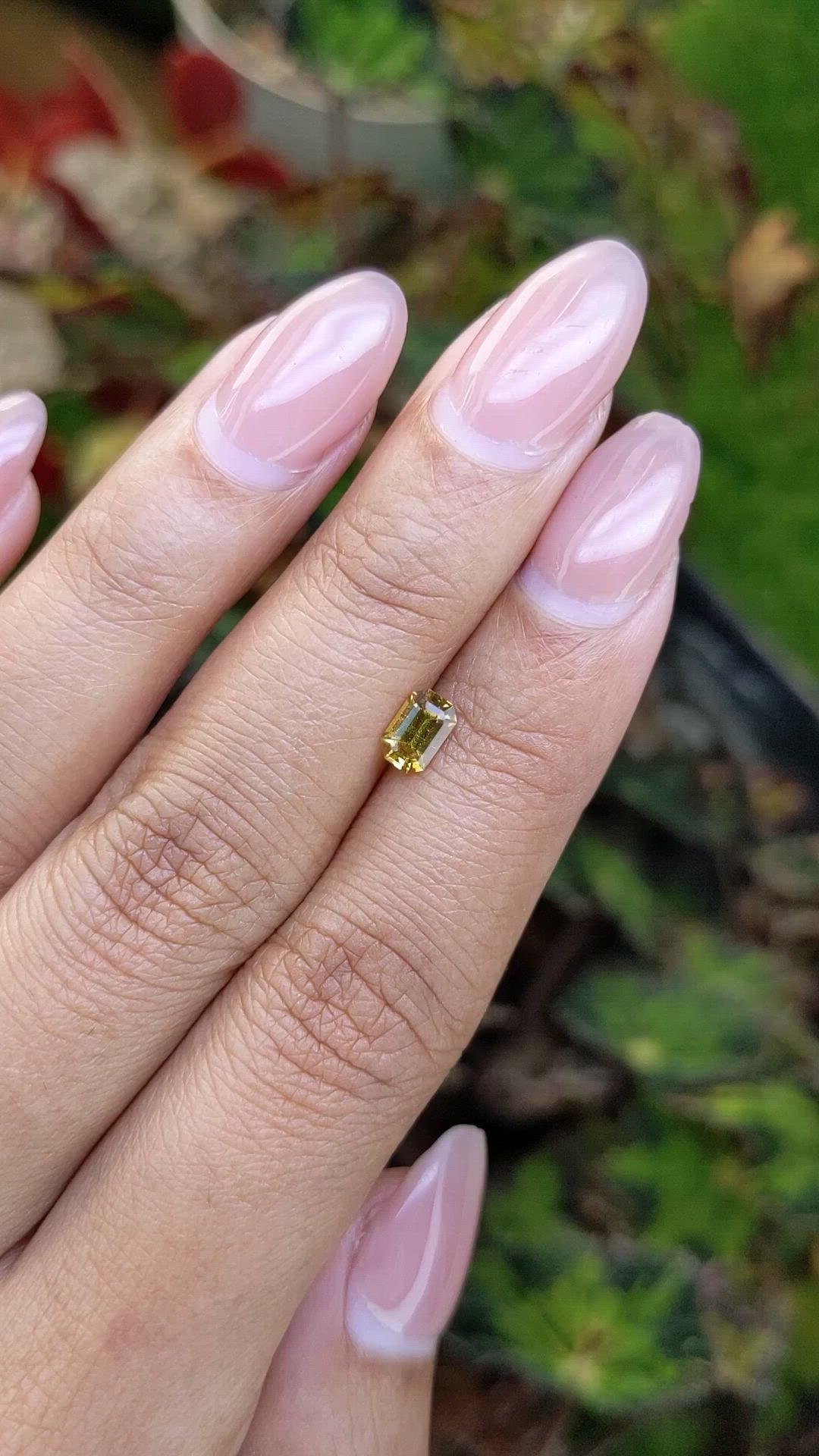 0.60 Ct. Greenish Yellow Sapphire from Ceylon (Sri Lanka) Size Video